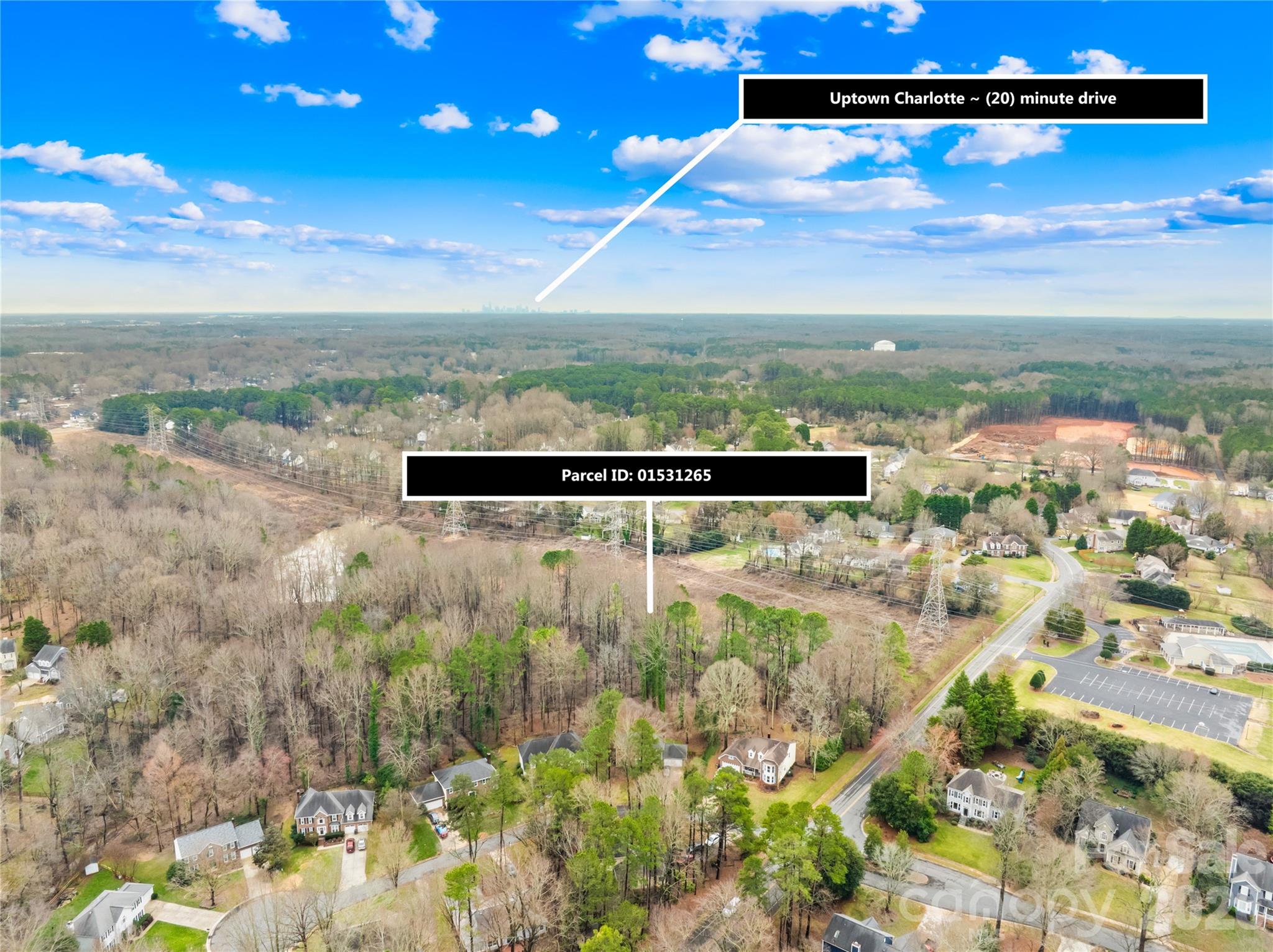 NEW PRICE! Rare opportunity to own 10+/- acres of private, wooded land in the heart of Huntersville's coveted Cedarfield community. This remarkable parcel offers the perfect canvas for your legacy estate — whether you envision a luxury equestrian property, a private multi-generational compound, or a modern homestead hobby farm.


Mature hardwoods and evergreens provide natural privacy screening while the gently sloping terrain creates exceptional building envelopes deep within the tree canopy. A Duke Energy easement corridor runs through the eastern portion of the property offering ready-made open acreage ideal for pasture, recreation, orchards, or gardens — transforming what others see as a constraint into a true lifestyle asset.


Enjoy the rare combination of seclusion and convenience — a town sidewalk graces your front property line, the community pool and playground sit just across Stratton Farm Road, and Lake Norman's waterfront amenities are just minutes away. Easy access to I-77 and Charlotte's employment centers makes this the perfect escape that never feels isolated.


Parcel access from Stratton Farm Road. Approximately 10 acres to be surveyed by Buyer. Excludes existing sewer line, pond, and remaining acreage on the McCoy Road side. Bring your builder. Bring your vision. This is where legacy begins.