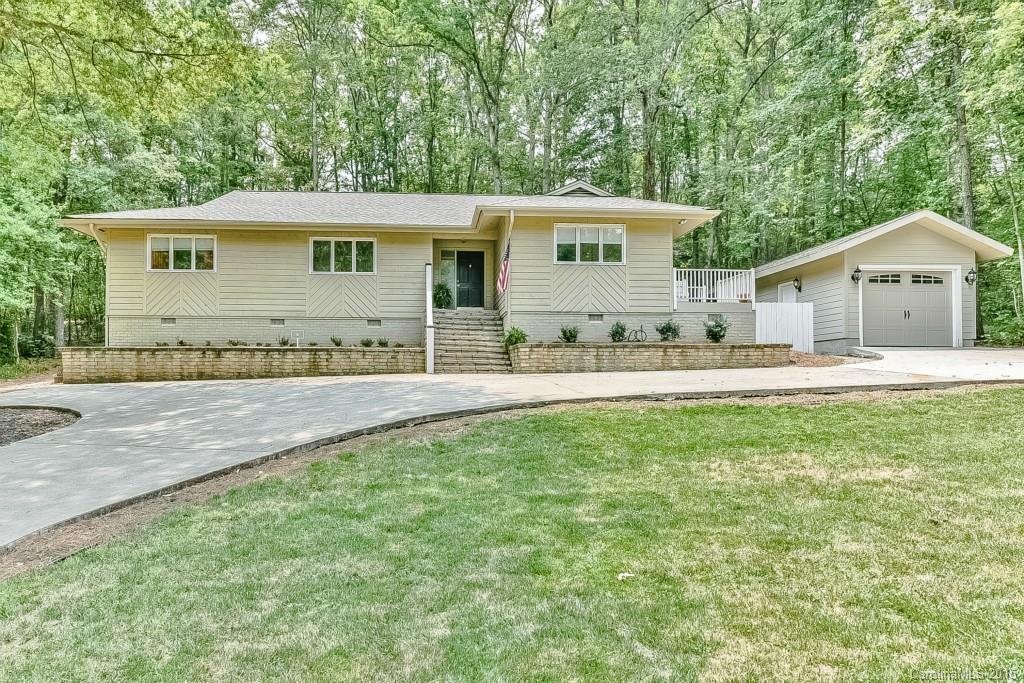 Move in ready with resort style living! Updated ranch in desirable River Hills gated lakefront community. Beautiful windows, lots of natural light. Large rooms, open layout, perfect for entertaining. Kitchen w/granite, oversized pantry, breakfast bar, SS appliances. Beautiful stone, wood burning fireplace in great room. Private patio off back, nature at your door step. 1 car detached garage WITH storage. Community has too many amenities to mention!