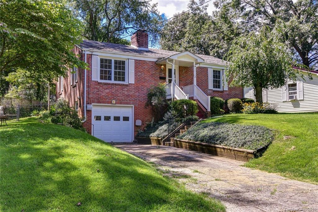 BACK ON MARKET-BUYERS RELOCATION PLANS CHANGED! Live on one of WAVLs best streets, just blocks from Haywood Rd w/ no-thru traffic & beautiful winter views of DT Asheville & the surrounding Mtns. 3BR 1.5BA cottage (1 BRs would make optimal office/nursery as it provides access to MA Suite), HWD floors, brick fireplace, new kitchen counters & an open floor plan. Brick exterior, newer roof/gutters, garage, private back porch & storage shed! Optimal location. Neat as a pin w/room to make it your own!