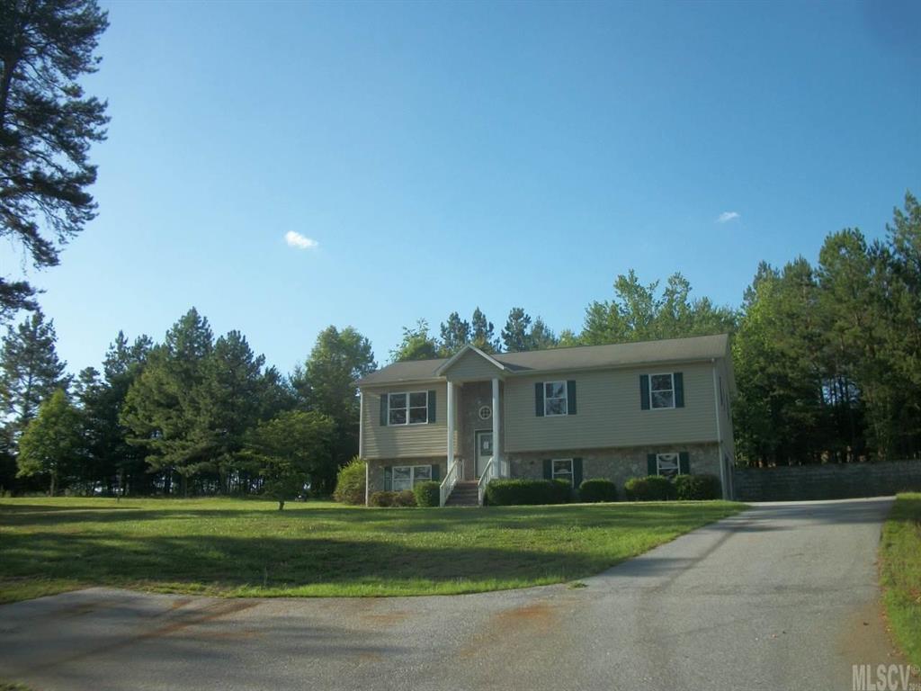 Great opportunity in this good sized home. Three bedroom two bath home with a full basement. The basement has a two car garage and also more finished space not included in sq footage. Open floor plan, nice kitchen, large dining room, good sized yard and mature landscaping.