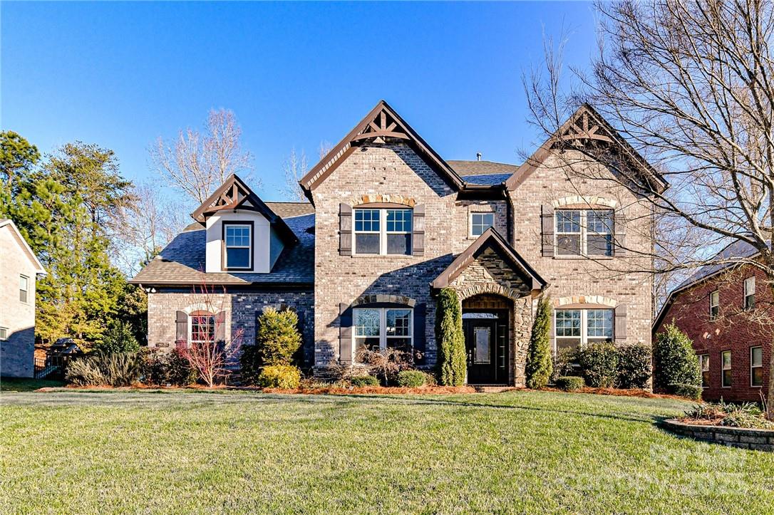 Stunning all brick home in the highly desirable Barber Rock neighborhood! This stunning home has amazing curve appeal! You will not stop smiling from looking at all the details of this home that is freshly painted and has been perfectly maintained. Downstairs enjoy the beautiful open concept living room with huge windows and lots of natural light, then the tastefully designed chef's kitchen with huge island to do lots of entertaining. Then step outside and enjoy the very private back yard in your paved patio or under covered patio, perfect to entertain friends and family. Upstairs you have 4 very specious bedrooms + a large bonus room that could be used as 5th bedroom. 

The Barber Rock neighborhood is a quiet, meticulously maintained, all brick community featuring neighborhood pool, playground, green areas, recreational area & sidewalks with street lighting. Low S.C taxes while conveniently located just minutes from Ballantyne for all your shopping, dining and entertaining.