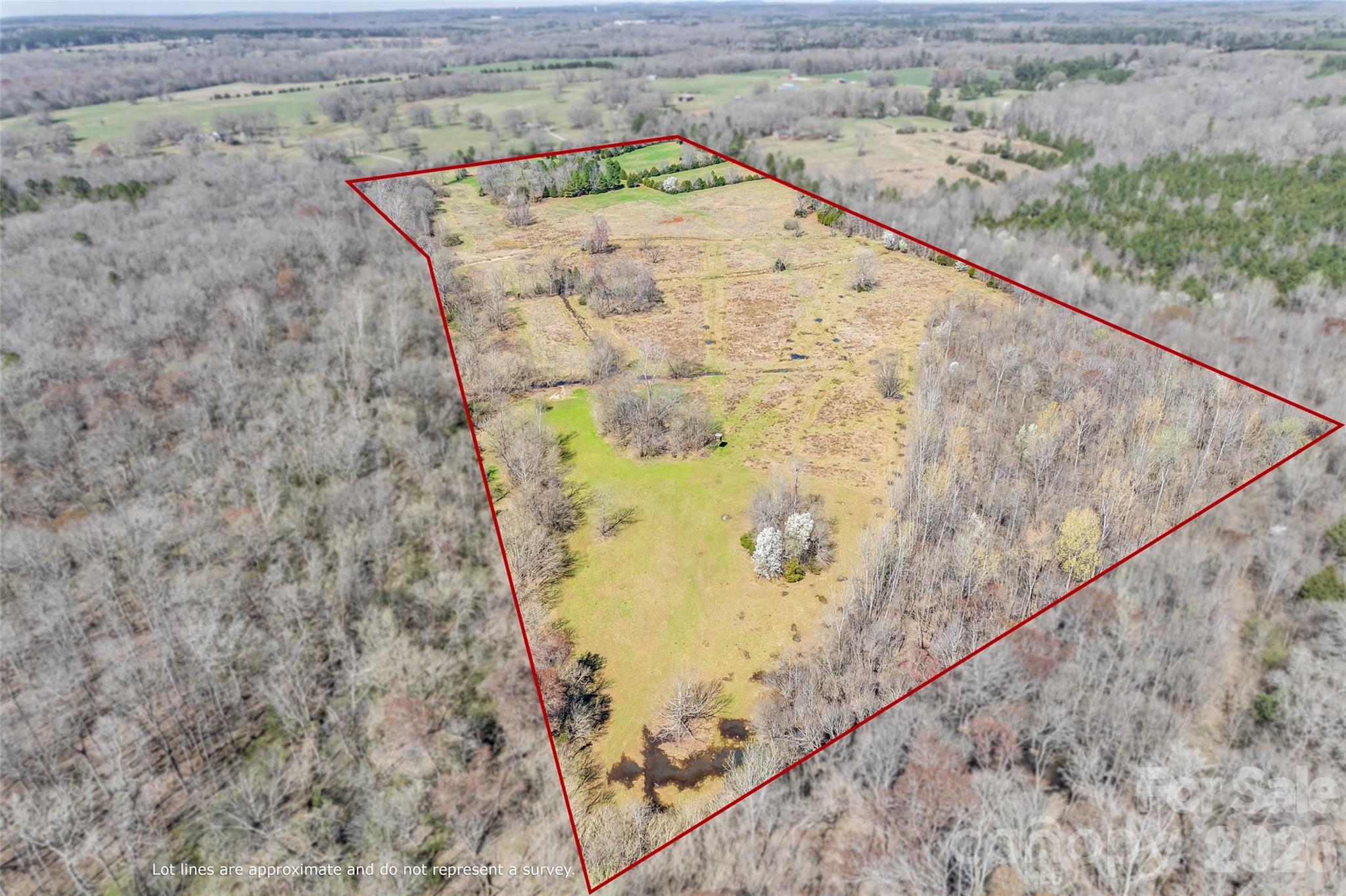 Prime vacant land- approximately 52.79 fenced deeded acres. A rare picturesque land that offers a tranquil blend of rolling pasture and mature woods. RUD zoning with an impressive road frontage of approximately 1,020 feet. There is potential to subdivide and build multiple homes, create a private estate, or farm. Serene Fishing Creek is along one side of the property. Whether you’re envisioning a homestead with horses or a retreat, this stunning countryside will certainly catch your eye.