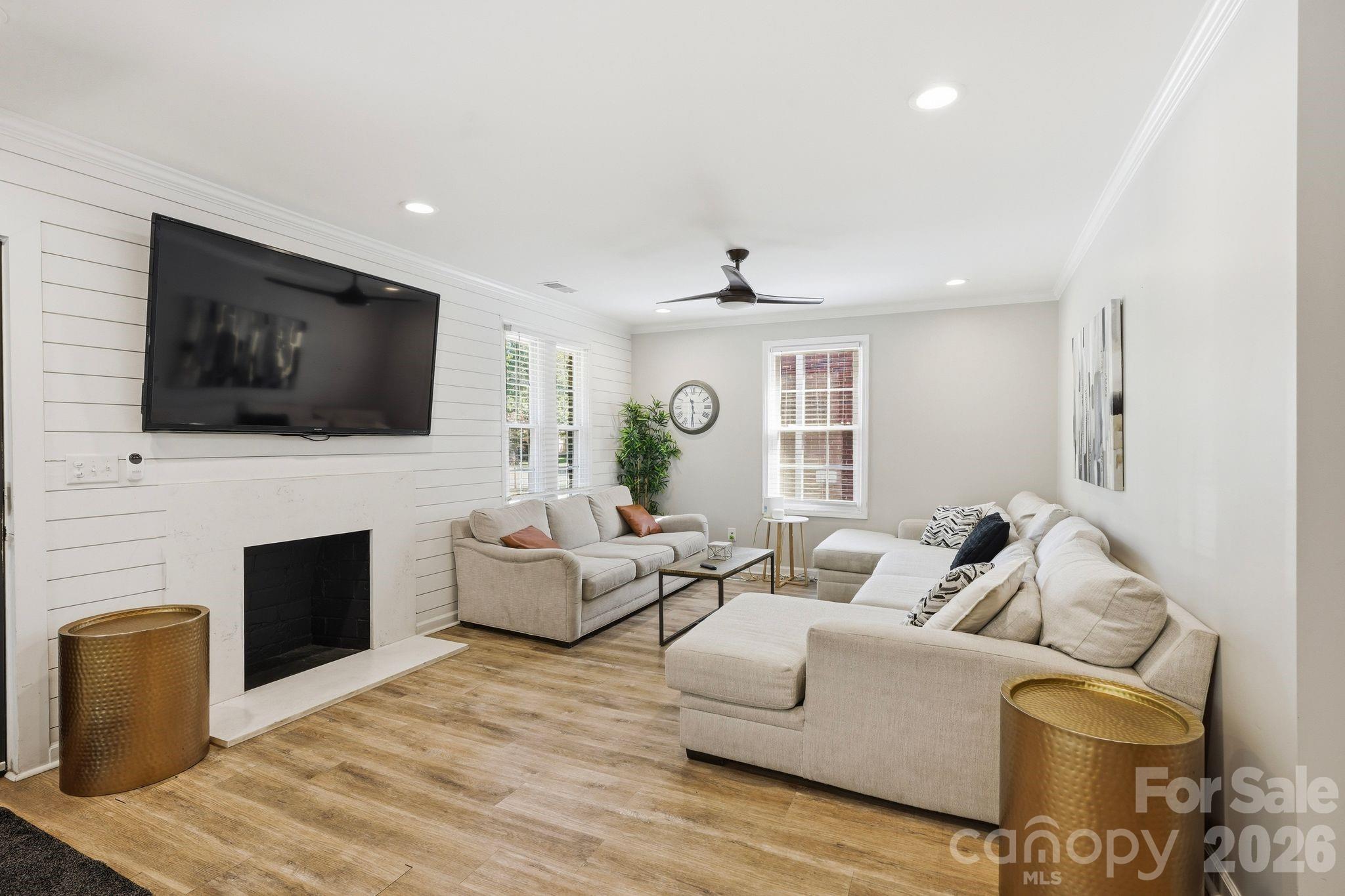 205 Grandin Road presents a rare Wesley Heights opportunity offering historic character, modern updates, and exceptional flexibility just minutes from Uptown Charlotte. Originally built in 1940, this full-brick property has been thoughtfully reimagined into two distinct living spaces, each with its own private entrance, kitchen, laundry, bedrooms, bathrooms, and gathering areas.

The main living quarters offer a warm and inviting layout with hardwood floors, generous natural light, a fireplace, spacious living and dining areas, and a functional kitchen featuring quartzite countertops, stainless steel appliances, ample cabinetry, and a center island. Multiple bedrooms and baths across the upper levels provide flexibility for owner-occupants, guests, work-from-home needs, or continued short-term rental use.

The lower level is fully self-contained and designed with the same level of functionality, featuring LVP flooring, shaker cabinetry, quartzite countertops, Samsung appliances, private laundry, comfortable living space, and well-appointed bedrooms and baths. This separate living arrangement creates meaningful options for multi-generational living, guest accommodations, long-term tenancy, or supplemental income.

With approximately 3,255 total square feet across both living areas, 8 bedrooms, and 5 full bathrooms, the property offers scale and versatility that is difficult to find in this location. The property has been professionally evaluated in the past as a residential income-producing asset, further highlighting its unique flexibility and investment potential. Buyers are encouraged to conduct their own independent due diligence regarding value, intended use, and future opportunities.

Set in one of Charlotte’s most connected historic neighborhoods, 205 Grandin Road is close to Stewart Creek and Irwin Creek Greenways, Rhino Market, Noble Smoke, Bossy Beulah’s, Town Brewing, Bank of America Stadium, Uptown Charlotte, and the continued growth throughout the West End corridor.

Whether used as a primary residence with separate guest quarters, a multi-generational home, an income-producing property, or a long-term investment, 205 Grandin Road offers a compelling combination of location, flexibility, updated interiors, and future upside in the heart of Wesley Heights.