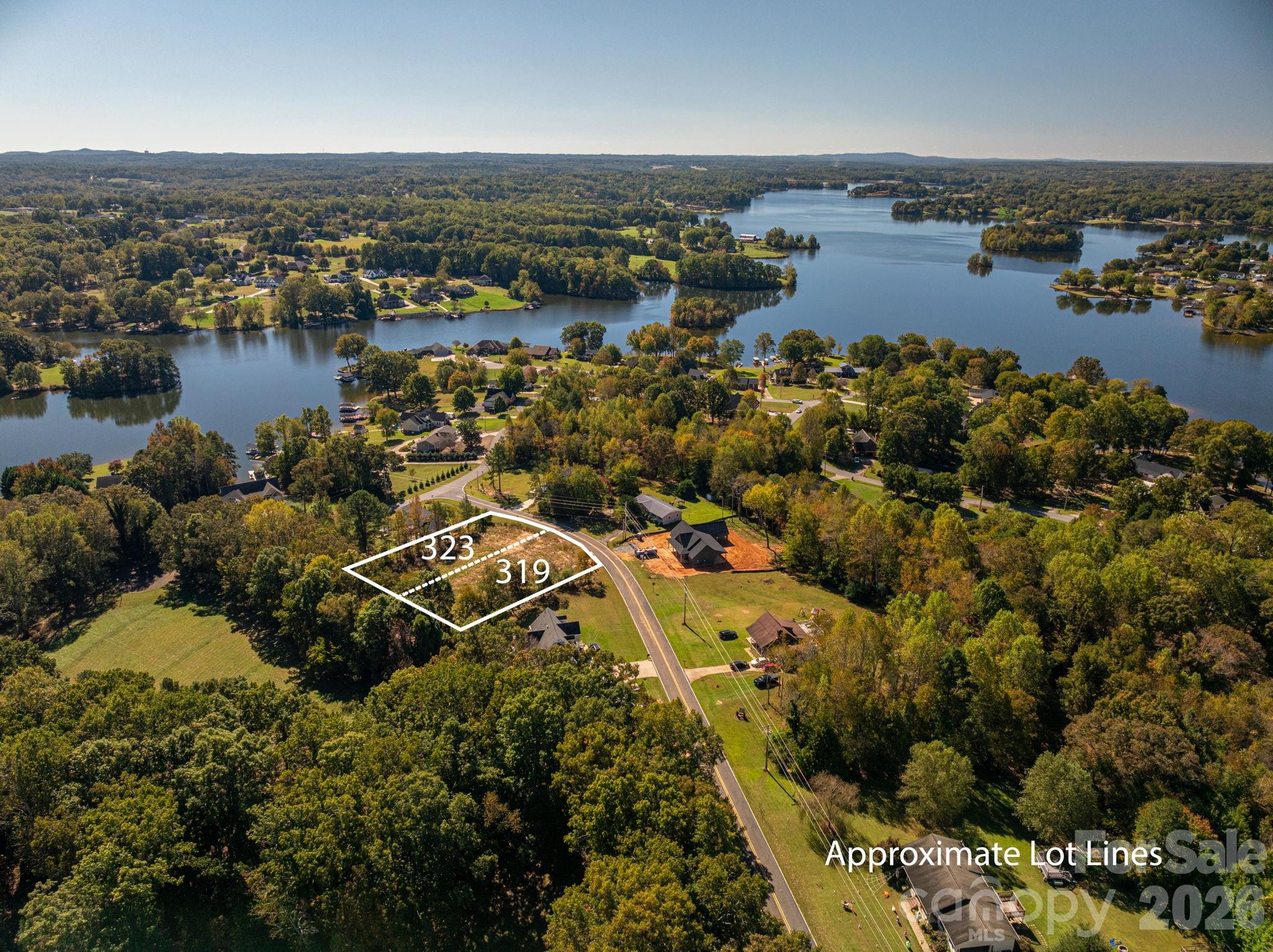 Rare opportunity to purchase TWO side-by-side lots at 319 & 323 Harbor View Drive! Offered together for added space, privacy, and flexibility, these parcels create an ideal setting for a larger homesite, multi-generational living, or future investment/building. The property also offers seasonal lake views, adding to the natural beauty of the setting. Both lots have been cleared and ready for your plans, and each parcel has been perked for a 4-bedroom home, providing an excellent opportunity. County water is available, making development even more convenient. Whether you’re looking to build your dream home with additional land, create two homesites, or invest in property with future potential, purchasing both parcels together offers a unique advantage. 
These properties present a great opportunity for homeowners, builders, or investors alike. Opportunities to purchase adjoining lots together with seasonal lake views w/ NO HOA are increasingly rare—don’t miss your chance to secure these two amazing lots in Harbor View! 319 Lot also listed separatley MLS #4357439
