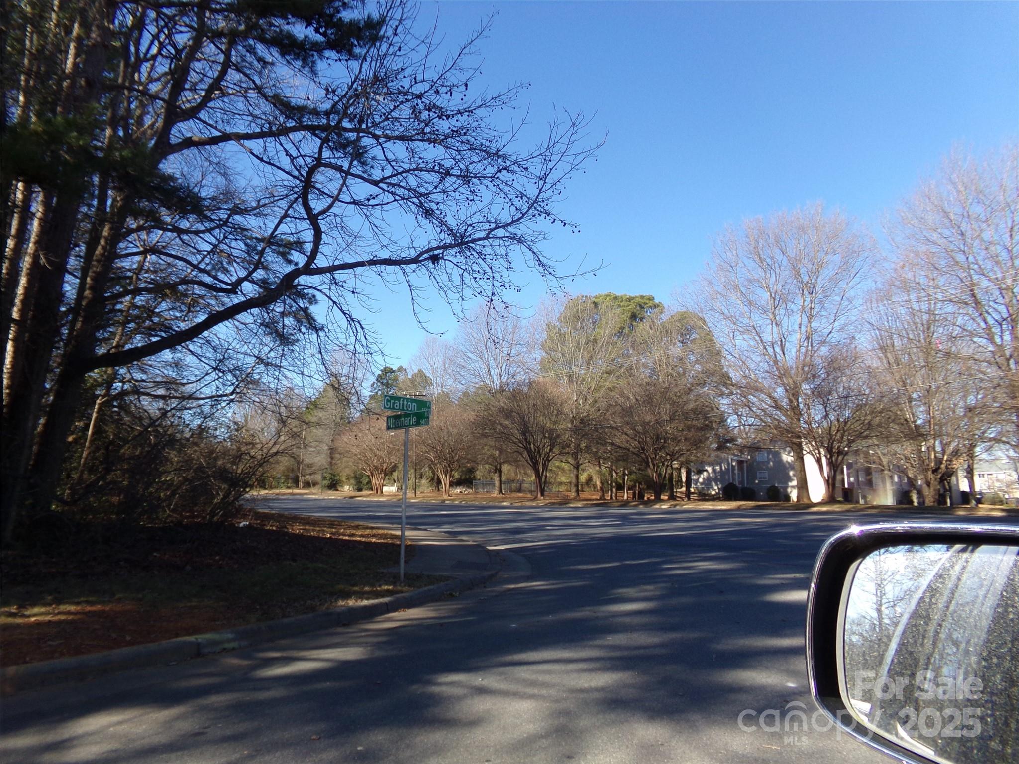 LAND (2 Lots facing Albemarle Road) HOUSE (5514 Grafton Place) for a total acreage of .981.  Lots are vacant with zoning of R17MF.  House is very charming with lots of handmade features built in 1952 and moved to the lot in 1960's.  With rezoning of the house lot, this property would be great for apartments or your business.  City water, City sewer, and natural gas on house lot.  Check with City of Charlotte for availability for vacant lots.  Tap fees are not paid for vacant lots.  Excellent location for your next business or project.  DON'T LET THIS OPPORTUNITY GET AWAY.  MAKE YOUR OFFER TODAY.   Thank you for your interest.