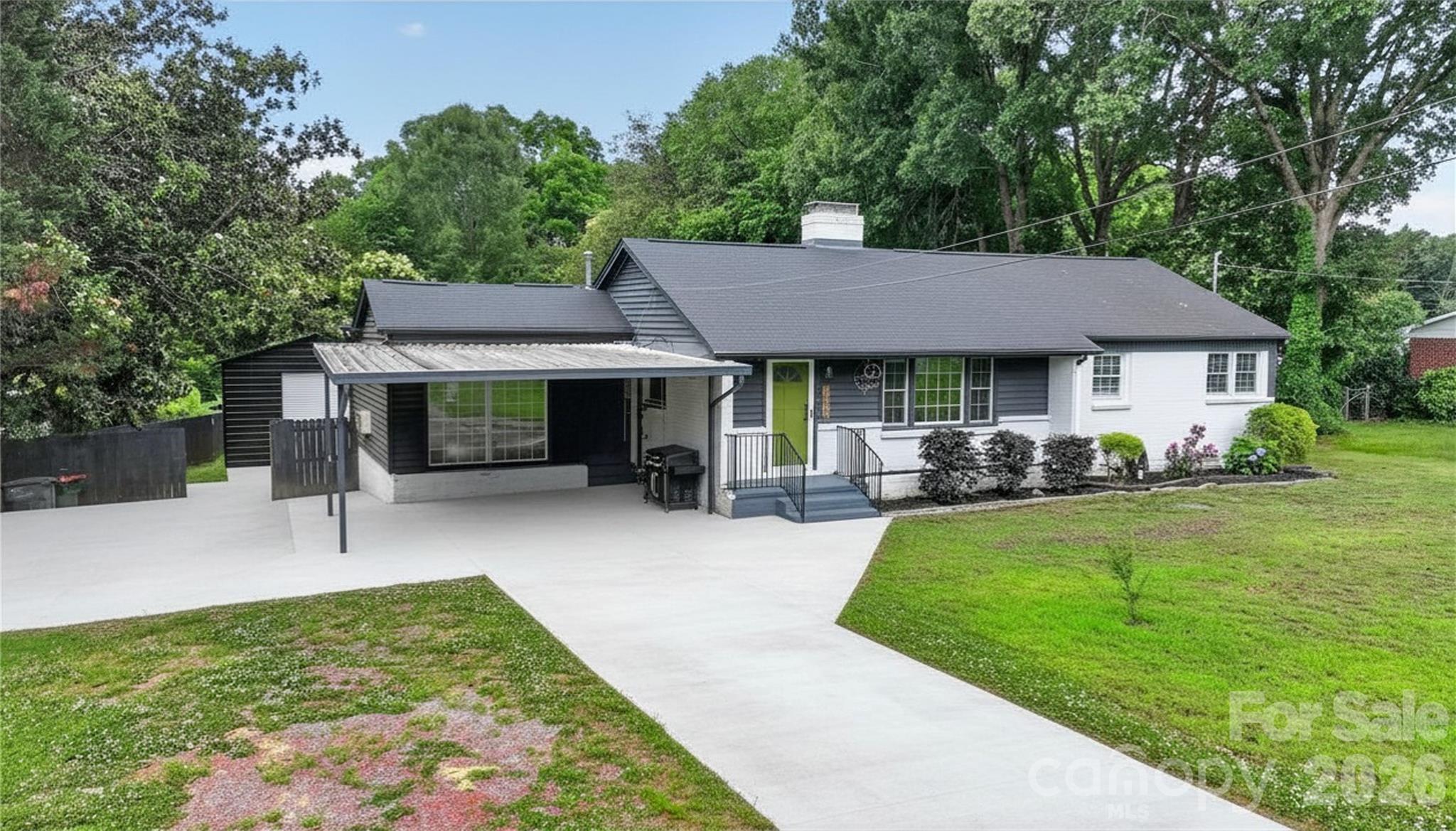 Welcome to a refreshed ranch-style home that perfectly balances modern comfort with incredible outdoor utility. Stepping inside, you’ll immediately notice the fresh interior paint and durable, stylish LVP flooring that flows throughout the home. The heart of the house is the expansive primary suite, bathed in abundant natural light and featuring a spa-like bath with a custom, oversized tiled shower. For those working from home, the dedicated flex room offers a serene office environment with views overlooking your private backyard.
Guest Suite/Studio, unique 5th bedroom with a private entrance and its own full bath and climate control—perfect for an in-law suite, or a private home studio. Interior recently painted, New HVAC in 2023, new roof 2022 & Encapsulated crawl space with dehumidifier and sump pump.  A brand-new 22x25 metal building featuring professional concrete flooring and an exterior drainage system—New electric Power box that may accommodate power to be run to Building, ideal for a car enthusiast or a garage/workshop. Green Thumb’s Dream offers 10x16 greenhouse fully equipped with dual fans and a spray watering system. Entertain on a massive 906-square-foot concrete rear patio, all enclosed by brand-new wood privacy fencing.