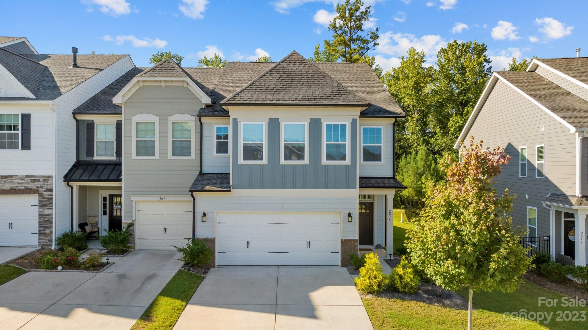 Beautiful end unit in the award-winning community of Mason's Bend in Fort Mill, SC. Built to incorporate the  Catawba River, Mason's Bend has an incredible amenity center with two phenomenal pools, a top-notch fitness center w an aerobic studio, multiple indoor & outdoor gathering areas, walking trails galore & a kayak/paddleboard launch ramp. This 2021 townhome shines like new! Enjoy upscale living in this end unit featuring an open-flowing floor plan providing plenty of great natural lighting, plus pendulum & inset lighting! Classic add-ons include a Kitchen Island, Stainless Steel appliances, tile backsplash and granite countertops; a fireplace in the living room; a pretty powder room  & a brand-new paver patio. Upstairs you'll find a large Master Bedroom with 2 walk-in closets. The Master Bath features dual vanities & an oversized shower. Two additional bedrooms also have walk-in closets. Buyer perks include the refrigerator, washer dryer, patio furniture and TV in the living room.