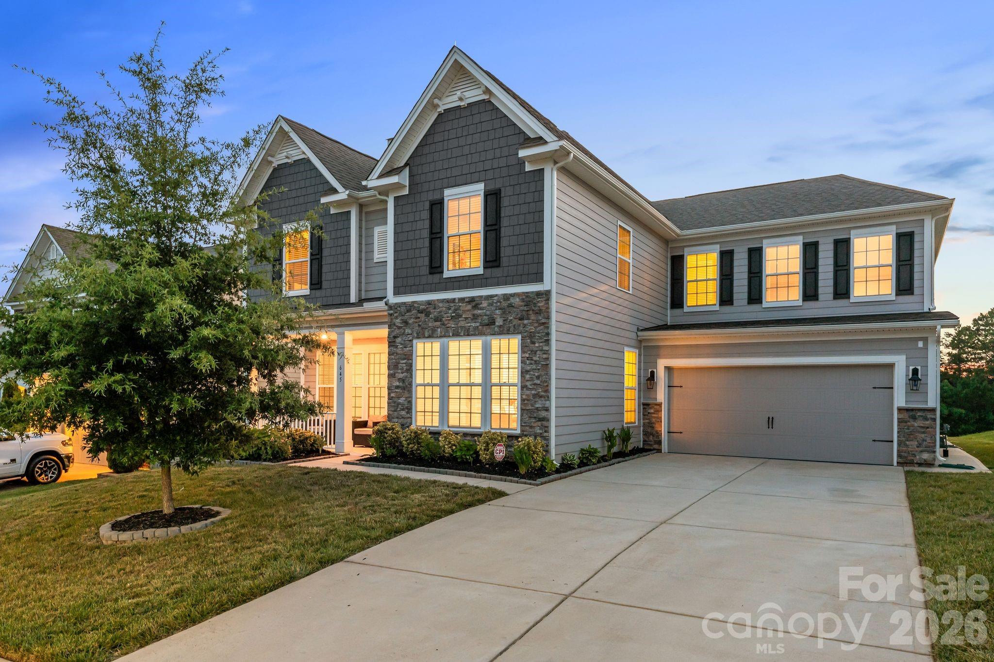Welcome to this beautifully maintained 5-bedroom, 4.5-bath home in the sought-after Cypress Pointe community! Fresh interior paint and a stunning custom accent wall create a warm, inviting first impression the moment you walk through the door.

Designed with both comfort and functionality in mind, the main level features a private home office, a formal dining room, and a spacious open-concept living area where the kitchen, breakfast area, and family room come together seamlessly. The large kitchen island creates the perfect gathering space for everyday living, entertaining, and making lasting memories. A main-level guest bedroom with a full bath offers flexibility for visitors or multi-generational living.
Upstairs, you'll find an expansive bonus room ideal for a media room, playroom, or additional living space, along with a spacious primary suite, generously sized secondary bedrooms, and a conveniently located laundry room.
Located in the desirable Cypress Pointe community, residents enjoy access to a neighborhood pool and playground while being just minutes from Lake Wylie, shopping, dining, and everyday conveniences. Charlotte Douglas International Airport is approximately 30 minutes away, making travel and commuting to the greater Charlotte area a breeze. Offering space, style, and an exceptional floor plan, this move-in ready home is ready to welcome its next owners.