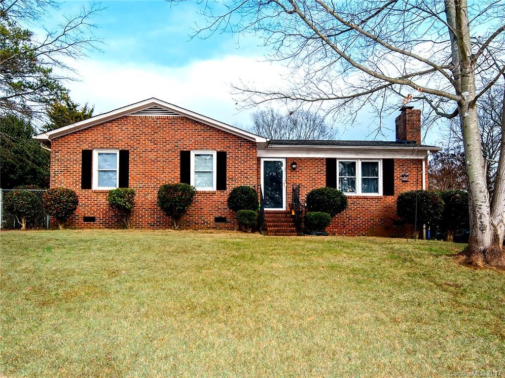 Not your average ranch! Home has an addition w/a game room & a pool. Come & play, make this home yours! New bamboo flooring, carpet, paint, bathroom vanity, shutters, roof in 2014, updated white electrical outlets & switches. Outdoor building has electricity, play set & pool table included. Pool has a new filter & chlorinator. The pool is fenced in & then there is an additional fence w/ outbuilding and swing set. There is NEW backsplash in the kitchen!