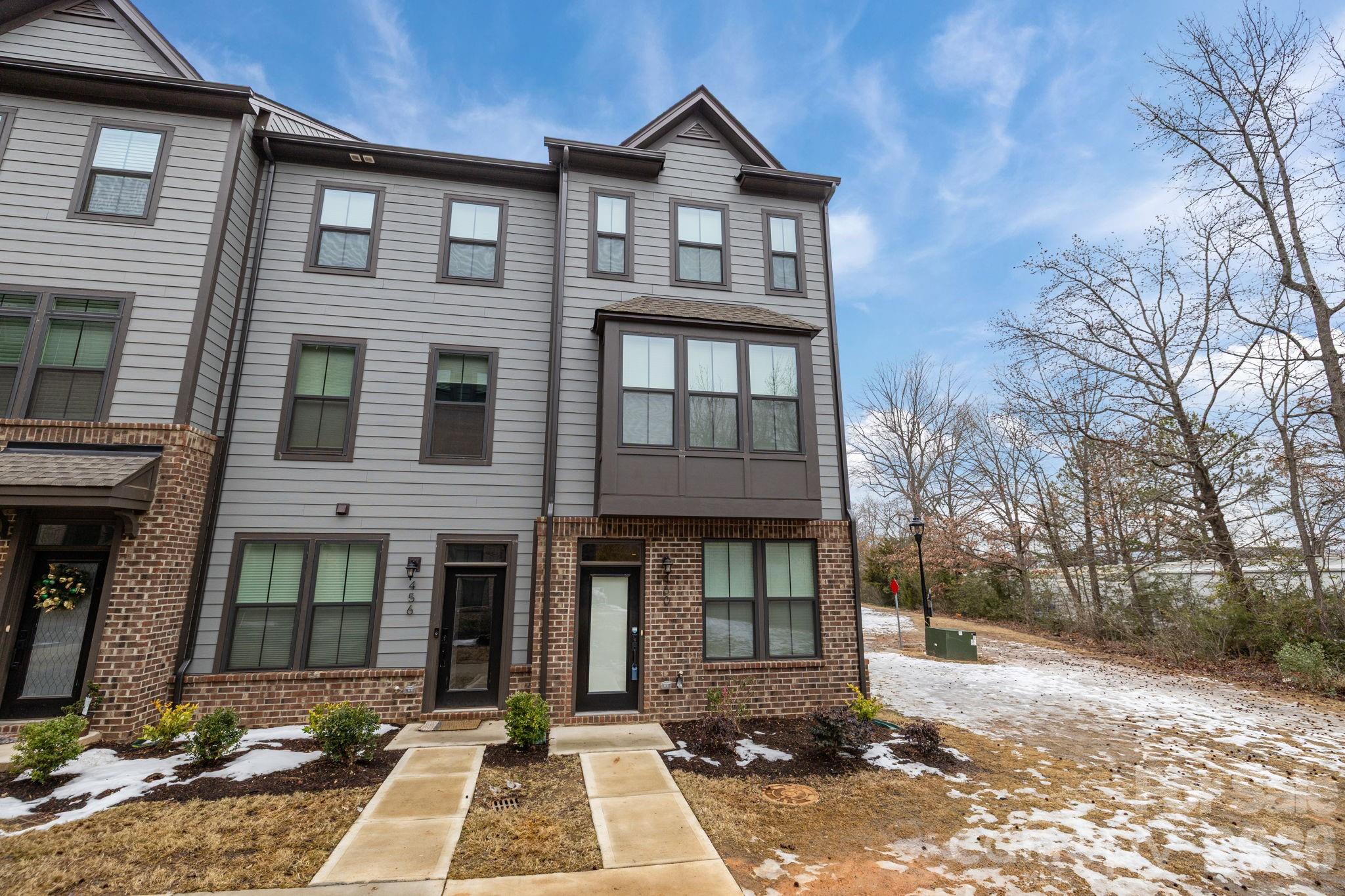 Welcome to Anderson Townhomes in the heart of NoDa  where urban energy meets modern comfort. This 3-story townhome offers 2 spacious bedrooms, 2.5 bathrooms, and a flexible layout designed for both everyday living and entertaining. The lower level features a converted living space perfect for a media room, home office, gym, or additional lounge area giving you versatility that sets this home apart. The main level flows effortlessly with an open living and dining area, while the upper level provides two private bedroom suites, each with its own full bath.
Step outside and enjoy unbeatable convenience. Located just minutes from The Plaza, multiple light rail stops, and some of Charlotte’s best local breweries, restaurants, coffee shops, and entertainment spots you’ll love being able to leave the car behind and experience NoDa the way it’s meant to be enjoyed. If you’re looking for low-maintenance living in one of Charlotte’s most vibrant neighborhoods, this is it.