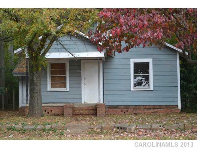 Great investment property near the University.  Two bedrooms, 1 bath, living room and eating area.  Needs a lot of TLC and a kitchen!  Hardwood floors, great lot.  Age of home is approximate.