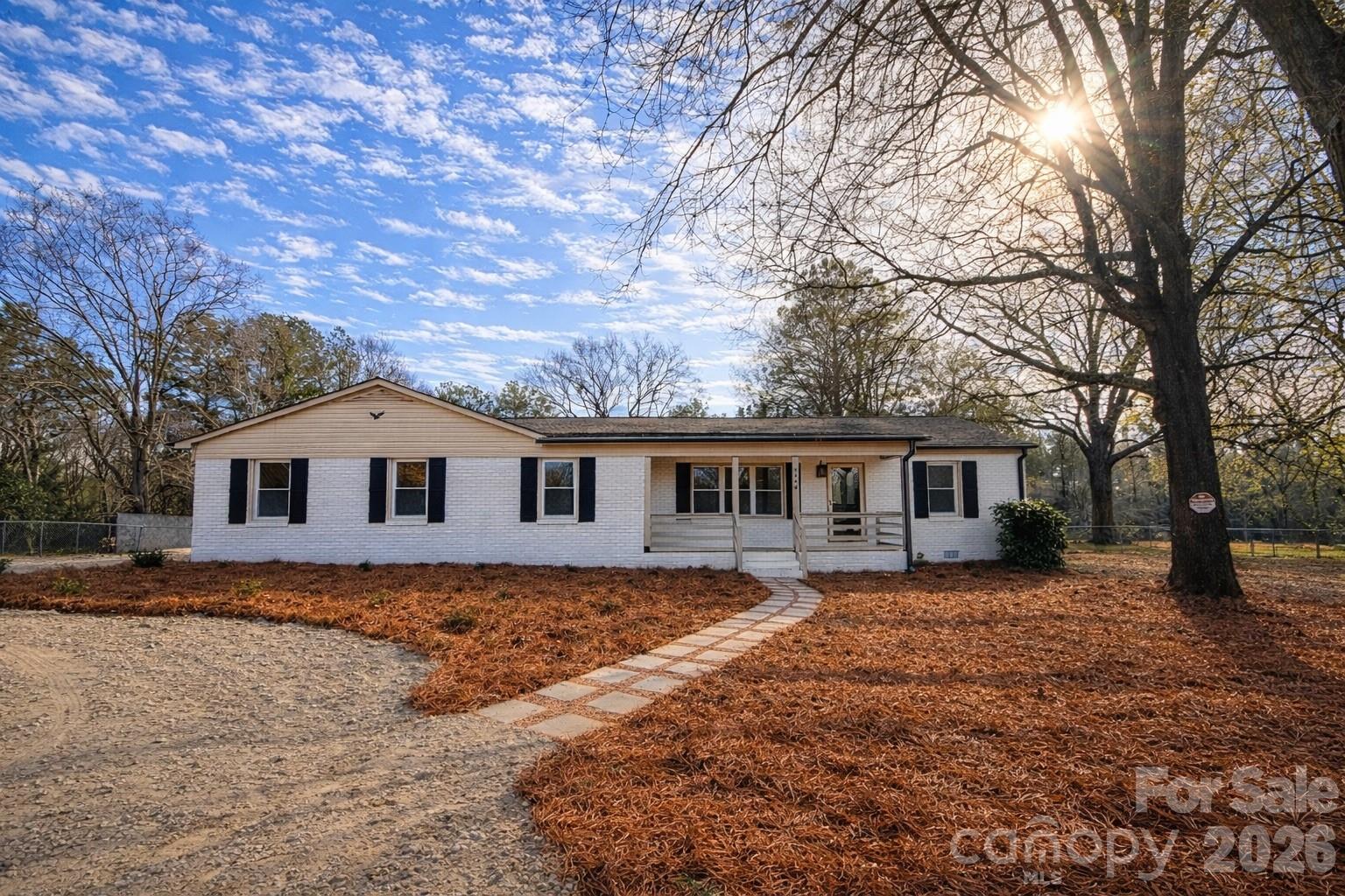 Welcome home to 5176 Lancaster Highway in Fort Lawn! This charming 3-bedroom, 2-bath home offers comfortable living with a functional layout and inviting outdoor spaces. Enjoy relaxing mornings on the front porch and evenings on the spacious back porch, perfect for grilling and entertaining friends and family. The fenced-in backyard provides privacy and room to enjoy the outdoors, while the attached carport adds everyday convenience. Located in a peaceful setting with easy access to surrounding areas, this home is ready for its next owner to make it their own. Schedule your showing today!