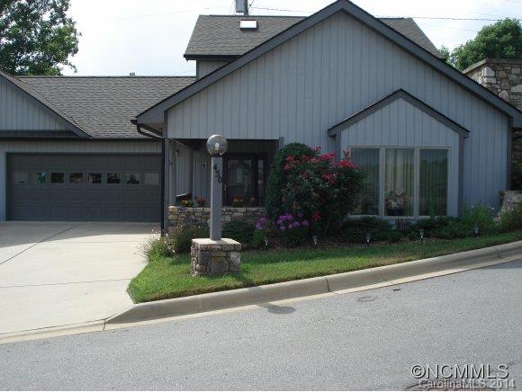 Wonderful 2 bedroom, 2 bath, home almost in downtown Weaverville offers privacy not usually found in a townhome. Quality workmanship throughout with tile, hardwood floors and carpet in the bedrooms. Kitchen accented with granite counters. Oak stairs with skylight. Vaulted ceilings in living area with fireplace. Loft area could be library, office or guest space. Walkable community near downtown and Lake Louise.