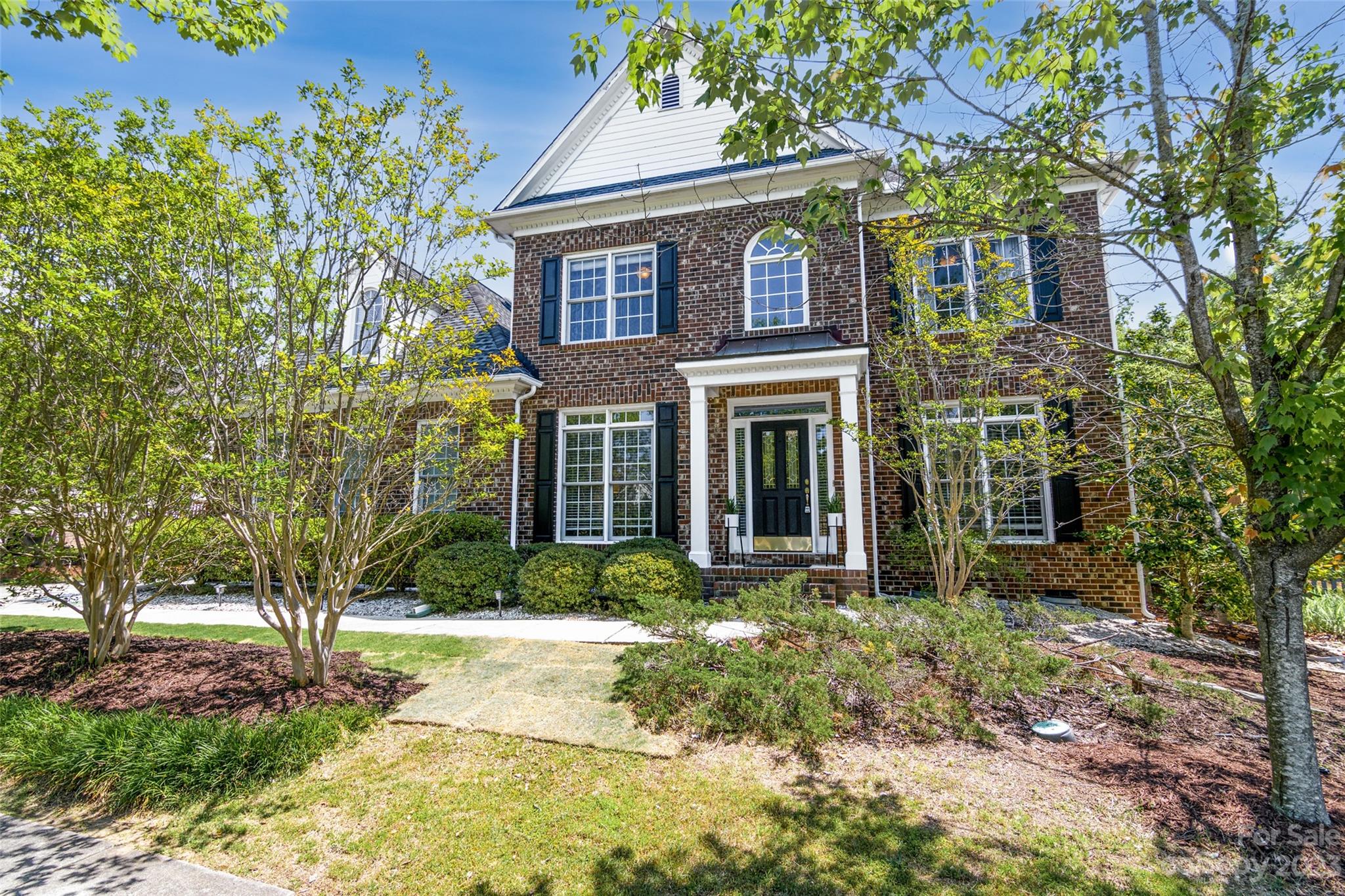 Rare gem in Lake Shore on beautiful Tega Cay peninsula along Lake Wylie! Rural feel lifestyle with walking distance to Lake Wylie, beachfront parks, walking trails, golf courses, community pool, playgrounds and much more. Open floor plan. Wood flooring and fresh paint throughout the house. Oversized owner's suite on main level with upgraded bathroom and walk in closet.  Kitchen with blue cabinets, brand-new cooktop & dishwasher.  Great room with fireplace, Office/study room and formal dining room on main level with lots of natural lights. Spacious four bedrooms, two full baths and an additional bonus room on 2nd level. Large bonus room is perfect to use as a media room or playroom for the family.  Huge, screened back porch for outdoor living. Fenced private & beautiful backyard with in ground irrigation & newly installed French drain. Spacious 2-car garage with new epoxy flooring. No HOA fees. Close to shopping, restaurants, I-77 and easy to commute to Charlotte. Great schools!