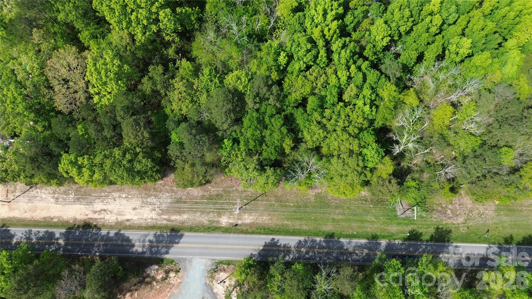 1.5-acre land featuring three combined lots with road frontage on Brief Road in Mint Hill Estates (28227) - Charlotte Unincorporated. This property provides an ideal setting for a custom home, offering both privacy and space in a serene, country-like environment. Conveniently located just minutes from I-485, shopping, dining, and everyday essentials, it combines peaceful surroundings with easy access to everything you need. An excellent opportunity for buyers looking to build in a growing and desirable area.