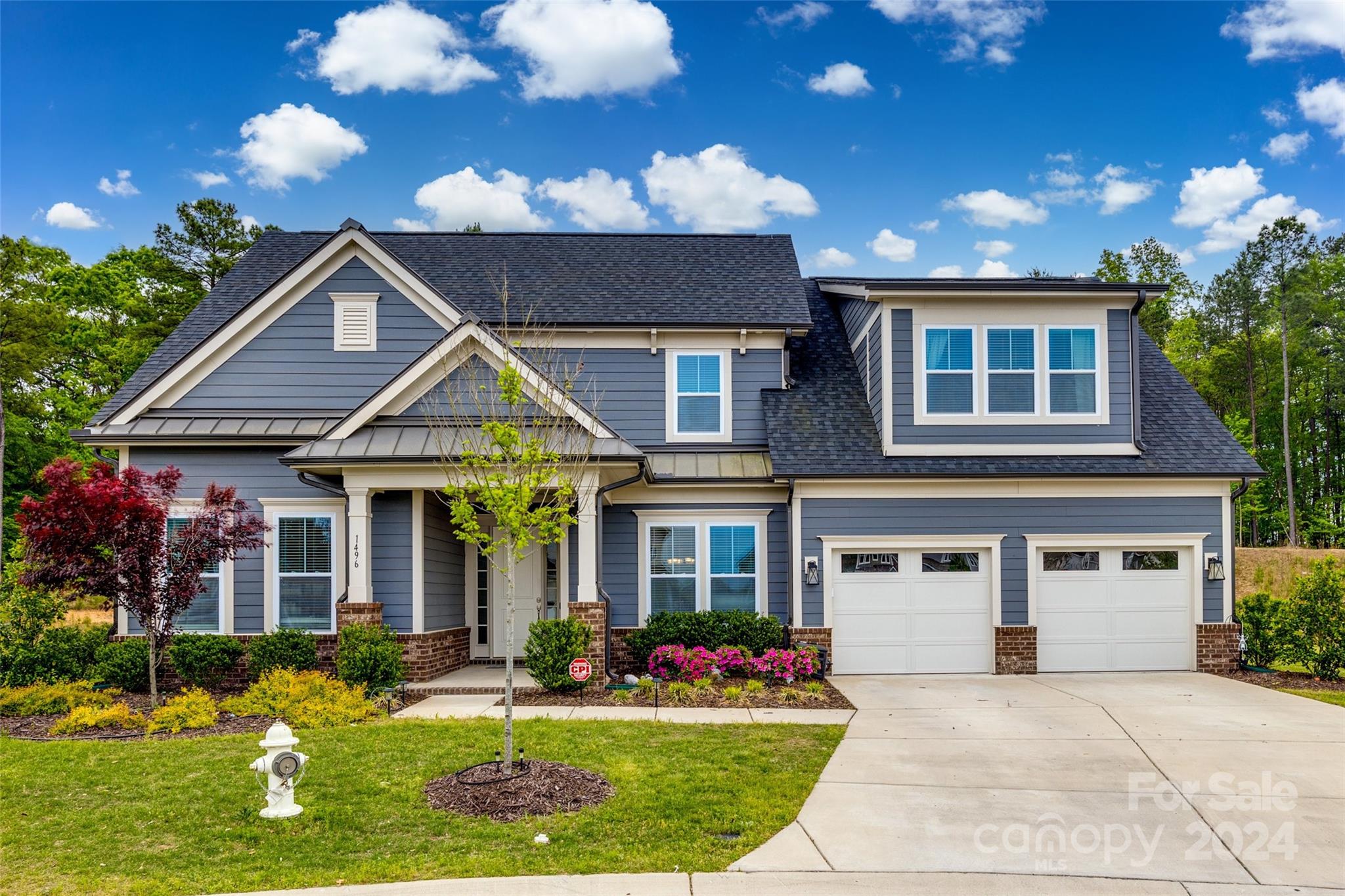 Located in Fort Mill's most desirable Masons Bend community, this home sits on a coveted cul-de-sac lot that backs up to nature.  It's the perfect spot for your next home.  It features 4 bedrooms, 3.5 baths with an office and primary bedroom on the main floor and a large loft upstairs.  The current owners selected many upgrades when building the home that include its flooring, double ovens, fireplace mantle, gas grill hookup on the back porch, fully insulated garage, real wood blinds and a Whole Home Air Purification System.

The Masons Bend community is located along the Catawba River and provides paddle board access, walking trails, a clubhouse, playground and outdoor pool.