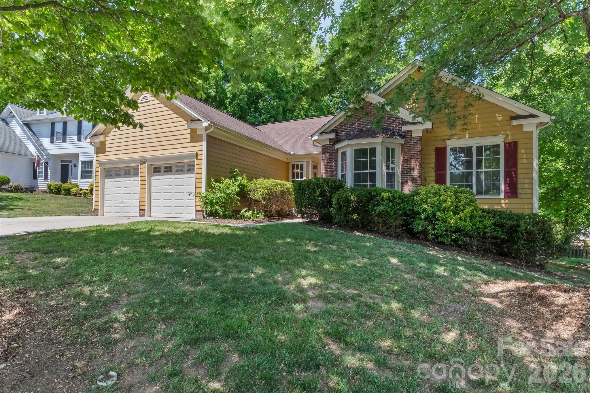 Best Deal In 28269! Great opportunity for a buyer to acquire some good old-fashioned sweat equity! Spacious one-level living, a convenient Charlotte location, and an opportunity to build equity with your personal updates. This 1,825 sq. ft. ranch-style home offers an open living and dining layout, high ceilings, abundant natural light, a charming bay window, and a fireplace that anchors the main living area.

The kitchen provides generous cabinet storage, ample workspace, and a center island that works well for everyday living, meal prep, and casual entertaining. The home features 4 bedrooms, though tax records reflect 3, and 2 full bathrooms, including a comfortable primary suite with a walk-in closet, stand-up shower, and large garden tub.

Fresh interior paint, professional cleaning and new primary shower surround have already been completed. Additional features include public water/sewer, natural gas heat, a 2-car attached garage, walk-in crawl space, and HVAC replaced in 2017. Although roof age is unknown, there are no active leaks and seller has reduced the price to allow buyers to either replace the roof at their convenience or do some other repairs/updates.

Located in a non-HOA neighborhood just minutes from I-85, I-485, I-77, dining, shopping, medical, entertainment, the University area, airport, and Uptown Charlotte. 

This is a great opportunity for a buyer looking for space, convenience, and to acquire some good old-fashioned sweat equity. Agents see Remarks for info on past repairs and reports available.