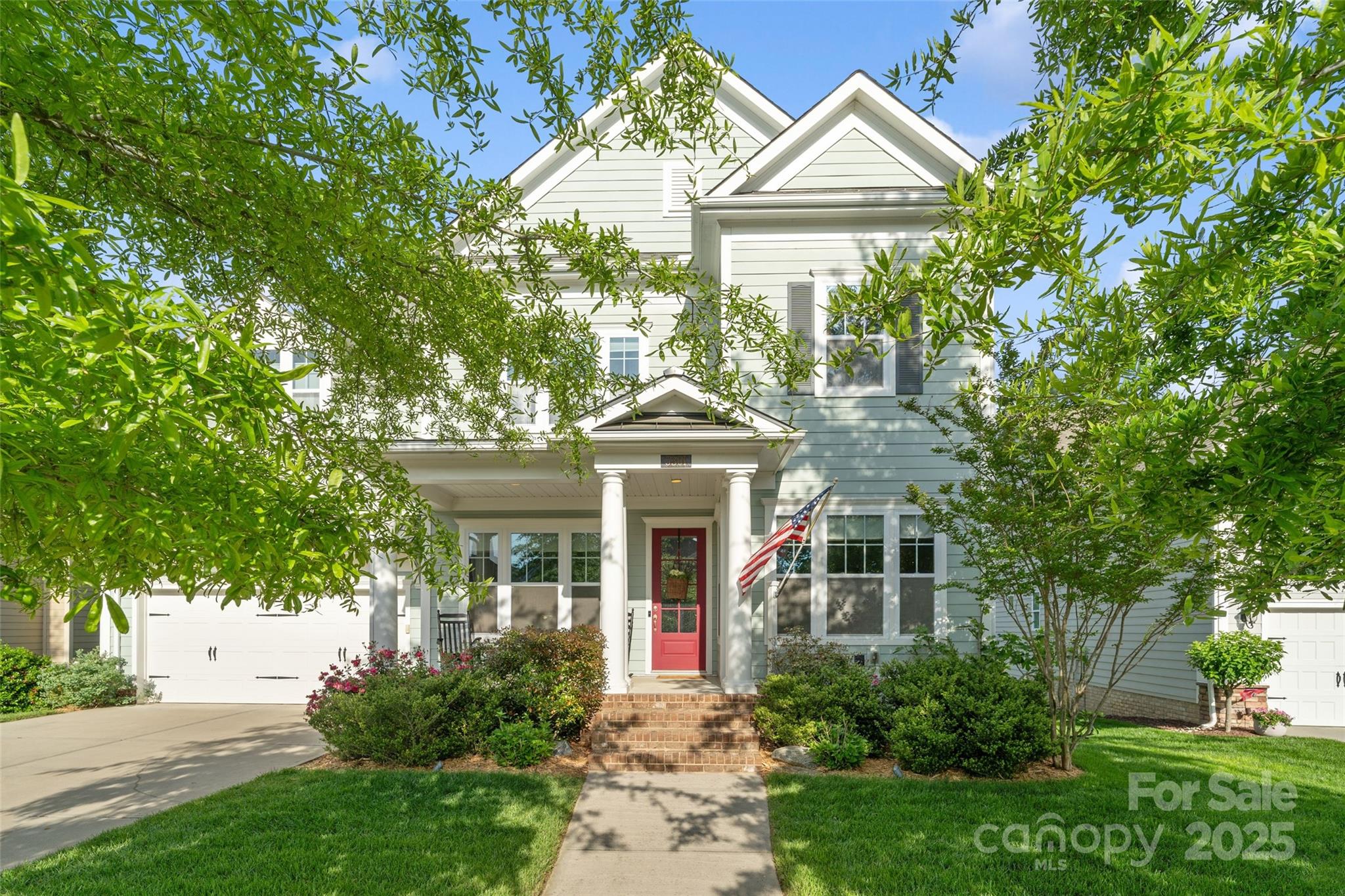 Welcome to this stunning & expansive John Wieland built 6 bed/5 bath home that offers room for everyone! Thoughtfully designed w/ flexibility & function in mind-the finished basement w/kitchenette & full bath offers the perfect set-up for multigenerational living or an entertainer's dream! This warm & inviting home w/ hardwood floors throughout the main level & features a first-floor guest suite. The gourmet kitchen features new GE Profile kitchen appliances, gas cooktop, large center island, & dining area overlooking the beautiful backyard. Four bedrooms upstairs, including the expansive primary suite w/beautiful hardwood floors & walk-in closet. Enjoy outdoor living on the screened porch, deck or patio, w/ plenty of room for entertaining or play. This home truly has it all; space, function, & style; conveniently located near Baxter Village & easy access to I-77. This desirable community has a pool, clubhouse, playground, pond w/ dock & walking trails. This stunning home is "The One!"