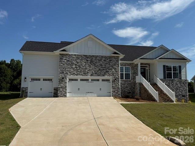 Only $1,000 down to write a contract—don’t miss this exceptional opportunity to own brand-new construction in the desirable McNeely Farms community in Mt. Ulla, NC! Situated on a spacious 0.94-acre homesite, this completed home offers peaceful living just minutes from downtown Mooresville, shopping, dining, and convenient access to I-77 and I-85.This thoughtfully designed 3,210 sq. ft. ranch with a 3-car garage features 4 bedrooms plus a private office and 3.5 baths. The main level includes 3 bedrooms, an office, and 2.5 baths, while the upper level provides a perfect guest or flex space with a large bonus room, additional bedroom, and full bath.
The open-concept layout is ideal for everyday living and entertaining, highlighted by 9’ ceilings and a spacious eat-in kitchen with an oversized island, granite countertops, tiled backsplash, and a gourmet stainless steel appliance package. Laminate wood flooring flows throughout the main living areas, and the formal dining room showcases elegant coffered ceilings. The primary suite offers a relaxing retreat with a beautifully tiled 5’ shower.
Enjoy outdoor living on the 16’ x 14’ covered deck overlooking a large, level backyard in a serene setting. Exterior features include durable Hardie board siding and an upgraded stone package. No HOA fees!
Move-in ready with premium upgrades and unbeatable incentives—schedule your showing today! Closing cost paid (except prepaids and points) with use of preferred lender.  Flex cash available to lower interest rate OR below market value rates available!!