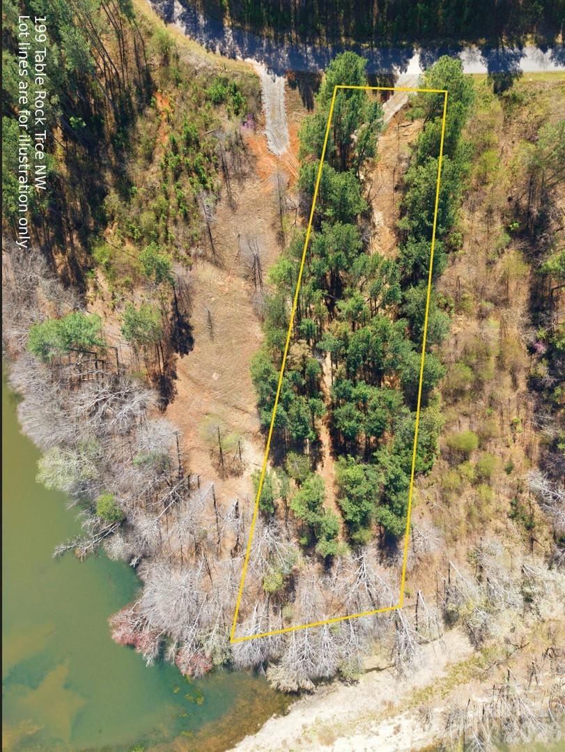 Reduced $25,000 from the original asking price!! Rare find- With approximately 166 feet of Lake frontage, this Lake front property has been partially cleared and is listed for under $100,000! When bought with the neighboring lot, you can enjoy over 365 feet of water views and access to call your very own! (Lots 129 & 130) 

City water and sewer, community overlook pavilion with gorgeous views, tables, chairs, grill and bathroom perfect for entertaining. There is also a Community garden and gazebo and a community boat and paddleboard launch. 

There are multiple current builds happening in this beautiful community. Come be a part of the growth! Build your own dream home and wake up to breathtaking views of the water and mountains.

This premium lot has been cleared, giving you a rare advantage—buyers can now truly visualize both the homesite and the stunning lake backdrop. This property offers the perfect canvas with a head start.

Conveniently located while still offering privacy and natural surroundings. Bring your builder and start planning your dream home on Lake Rhodhiss.

Buyers/Buyers Agent to verify docking process with Duke Energy. Lot was deemed dockable by Duke Energy many years ago but that has expired and will need a new application. Seller fought tax hikes making the tax value look low, but value can be seen on the neighboring lots and the buyer can enjoy less taxes.

Buyers/Buyers Agent to verify docking process with Duke Energy.