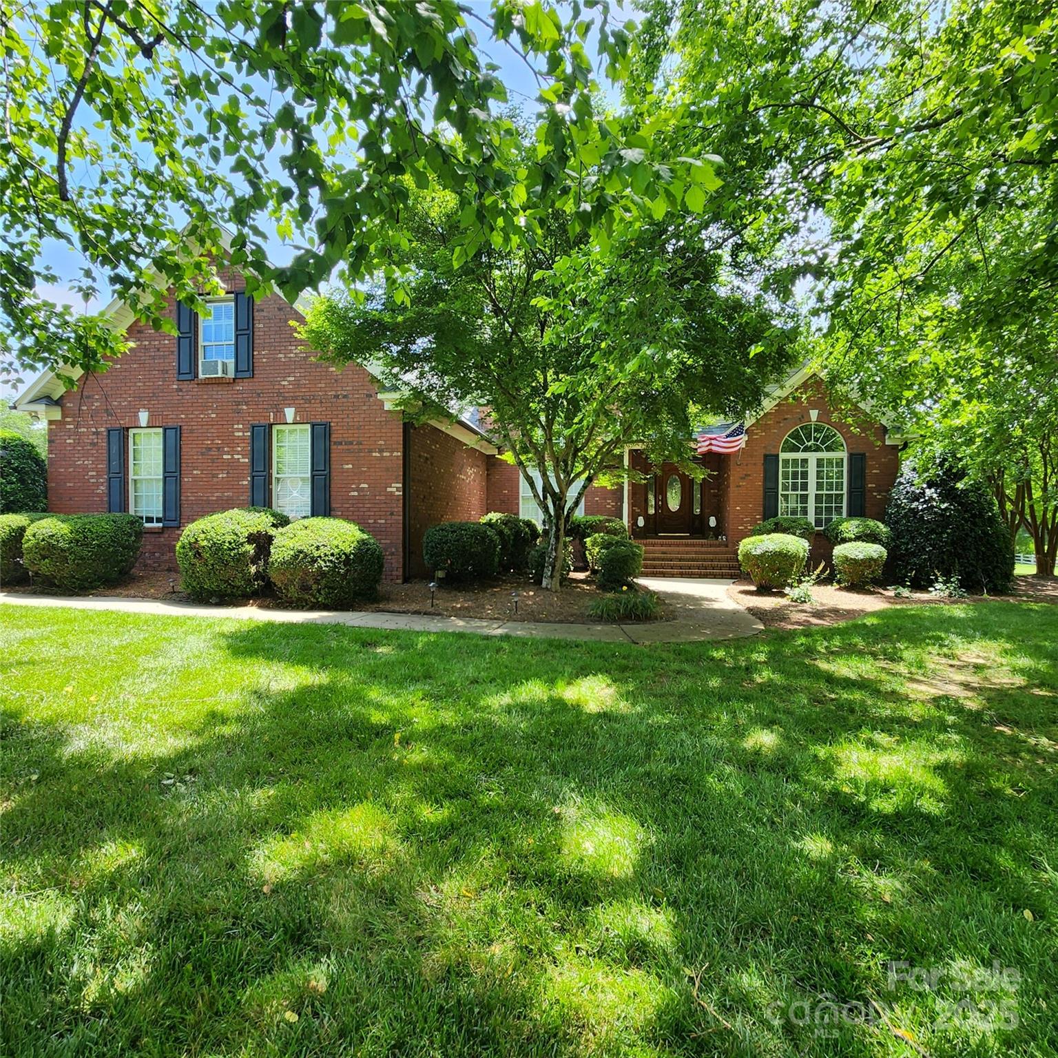 Welcome to your dream home in the desirable Miller Pond community! Situated on a gorgeous landscaped .81-acre level lot; this home combines space, functionality, and charm; all just minutes from shopping, dining, and more. This beautifully maintained ranch boasts a soaring cathedral ceiling, cozy fireplace in the great room with hardwood flooring throughout main living area.  Kitchen offers stainless appliances, new granite and backsplash.  Offering a split-bedroom layout with a spacious bonus room above the attached 2-car garage. The primary suite offers trey ceiling, whirlpool tub, separate shower, dual vanities, and generous walk-in closet. All bedrooms have recently replaced carpet. Enjoy the large rear screened porch ideal for relaxing. The property also includes a large detached garage featuring bay door, workshop potential or extra storage.  The second level offers additional space for storage, or hobbies.  New impact resistant roof/gutters 2024 on home and detached garage.