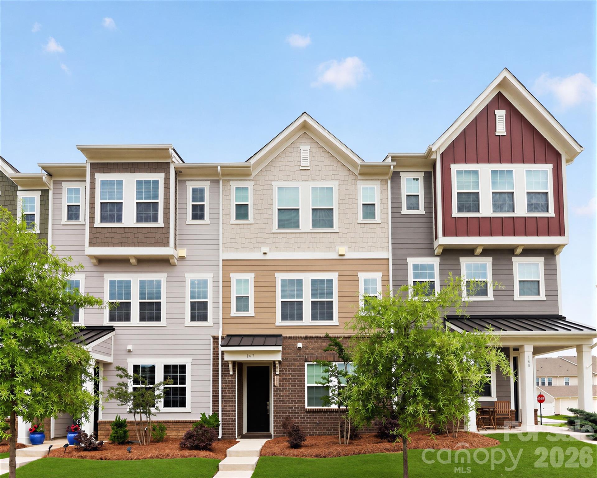Why wait for new construction when you can move right into this practically brand-new, 3-story townhome by Lennar? 4 beds, 3.5 baths, and a rear-load 2-car garage, this layout offers the perfect blend of space and style. As you enter you’re greeted by a flexible lower-level bed and bath that can be used as a guest suite or home office — perfect for additional family, visitors or remote work. Upstairs is a bright, open kitchen and living area that flows seamlessly out to a covered patio, complete with two exterior storage closets. Your private sanctuary is on the top floor, featuring the spacious primary suite, two additional bedrooms and a conveniently located laundry room off the hall. And you’re literally steps away from Elizabeth’s gorgeous new amenity center! Plus the neighborhood is just minutes from downtown Fort Mill, brand-new schools, sports fields and major routes (Hwys 160, 21, 77, and Dobys Bridge) for an easy commute. Bonus: the highly anticipated Harris Teeter shopping center is already under construction just up the road. Come check it out!