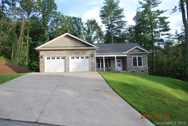 Well maintained, move-in ready home in desirable West Marion area.  This 3 bedroom, 2 bath home features vinyl/stone siding, nice open concept with 9' ceilings, wood, ceramic and carpeted floors, maple kitchen cabinets with granite counter tops, large pantry, master suite with tub and walk-in shower and walk in closet along with a large laundry room make this a home you do not want to miss.   Nice french doors open to the level back yard, an oversized 2 car garage and covered front porch overlooking the front yard and wooded surroundings at to the privacy.  This home is conveniently located to I-40, YMCA, hospital, Marion, Lake James and more.