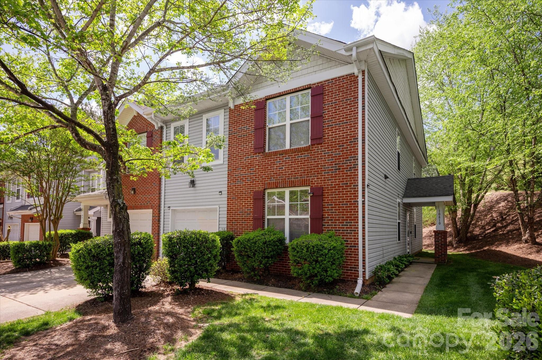 Investors or families! This end unit Ballantyne townhome is perfectly situated just 1/2 mile from top-rated Ardrey Kell High School. This lovely corner lot updated 3-bedroom, 3-bathroom townhome in this premier area, offers a move-in-ready living experience highlighted by a two-story foyer and extensive recent capital improvements. This residence features a refreshed kitchen with new countertops (2025), and a suite of modern appliances including a new refrigerator, GE stove/range (2024), and dishwasher (2024). The main level is designed for comfort and efficiency, with new luxury vinyl plank flooring (2025), a ventless gas fireplace (2024), while the finished garage provides high-quality new epoxy flooring and ample storage. Significant infrastructure upgrades ensure long-term peace of mind, including a comprehensive HVAC overhaul featuring a new condenser and evaporator coil (2023) and a gas furnace (2025), alongside a professionally re-insulated attic via the Duke Energy program. Combining prime proximity to elite shopping and dining with thoughtful interior updates and a spacious upstairs loft, this home represents a rare opportunity for stylish, low-maintenance living. The HOA covers water/sewer, landscaping, common area maintenance, and pool access.