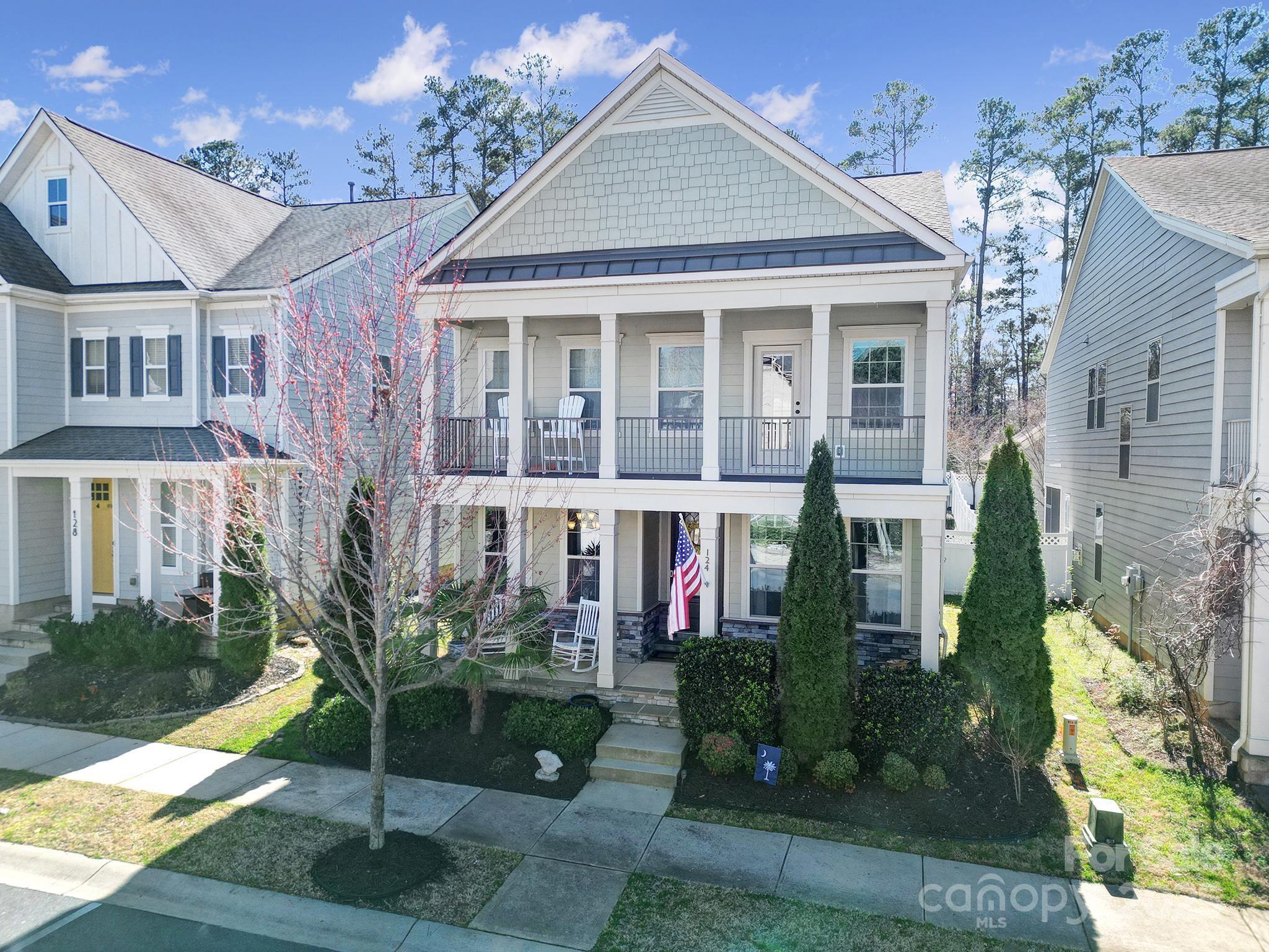 Amazing Charleston Style Colonial located on a cul-de-sac in Brayden.  Over $30,000 of upgrades since built in 2016.  Open floor plan with light and bright gourmet kitchen, with large granite island, gas cooktop, & large  pantry. Kitchen opens to covered porch which leads to your paver patio and fenced serene rear yard. Home also offers 9 ft ceilings. First Floor has a guest bedroom or this room could be an office/flex room.  First floor also has a full bath. Second floor has 3  bedrooms including a fabulous master bedroom suite  and  a loft. Loft opens to a second floor covered balcony where you can sit and relax.  Community has a clubhouse, pool, playground, pond, park and walking trail. Walk to Brayden Village (Inizio Pizza, Crazy Mason Milkshakes, Duck Donuts, and more) Firebirds, and First Watch across the Street. Baxter Village or Kingsley 5-10 mins. 30 mins to Uptown. Brayden has many  holiday events throughout the year too! December is all lit up and Halloween too!