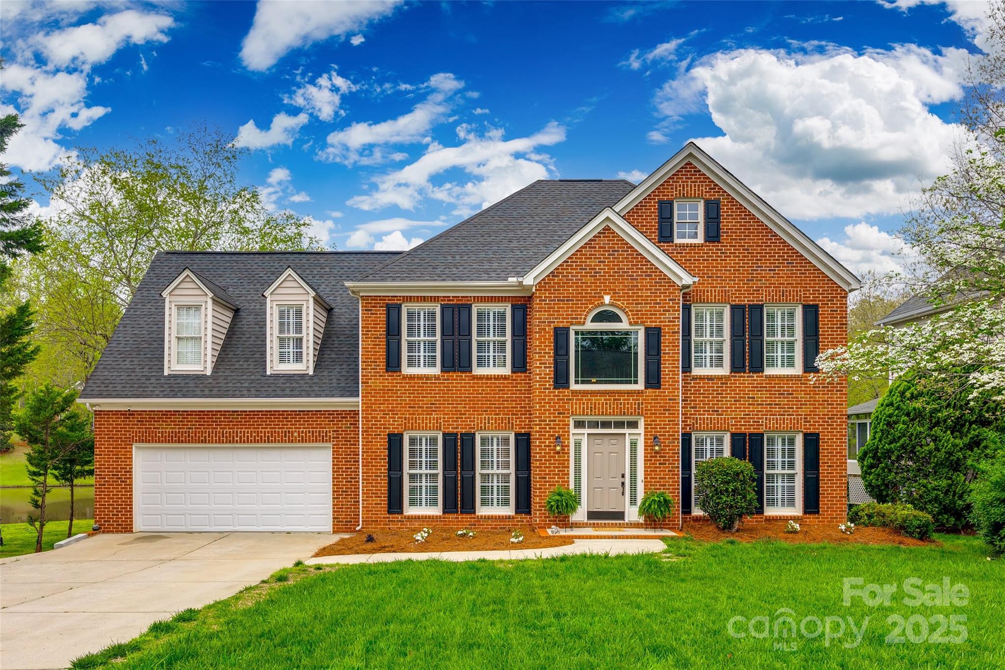 Welcome to 2515 Barrington Court, Rock Hill, SC – a beautifully updated 4-bedroom, 2.5-bath home that blends timeless charm with modern comfort. Located in a desirable neighborhood, this well-maintained property offers great curb appeal and overlooks a tranquil neighborhood pond. Inside, you’ll love the kitchen with granite countertops, stainless steel appliances, a gas range, and elegant tile flooring. The main level features rich hardwoods and custom window treatments throughout. Upstairs you'll find four bedrooms, including a spacious primary suite with tray ceiling and sitting area. Enjoy peaceful views, stylish finishes, and a functional layout perfect for everyday living. Move-in ready and full of character, this home is ready for its next chapter. Schedule your private tour today and fall in love with everything 2515 Barrington Court has to offer!