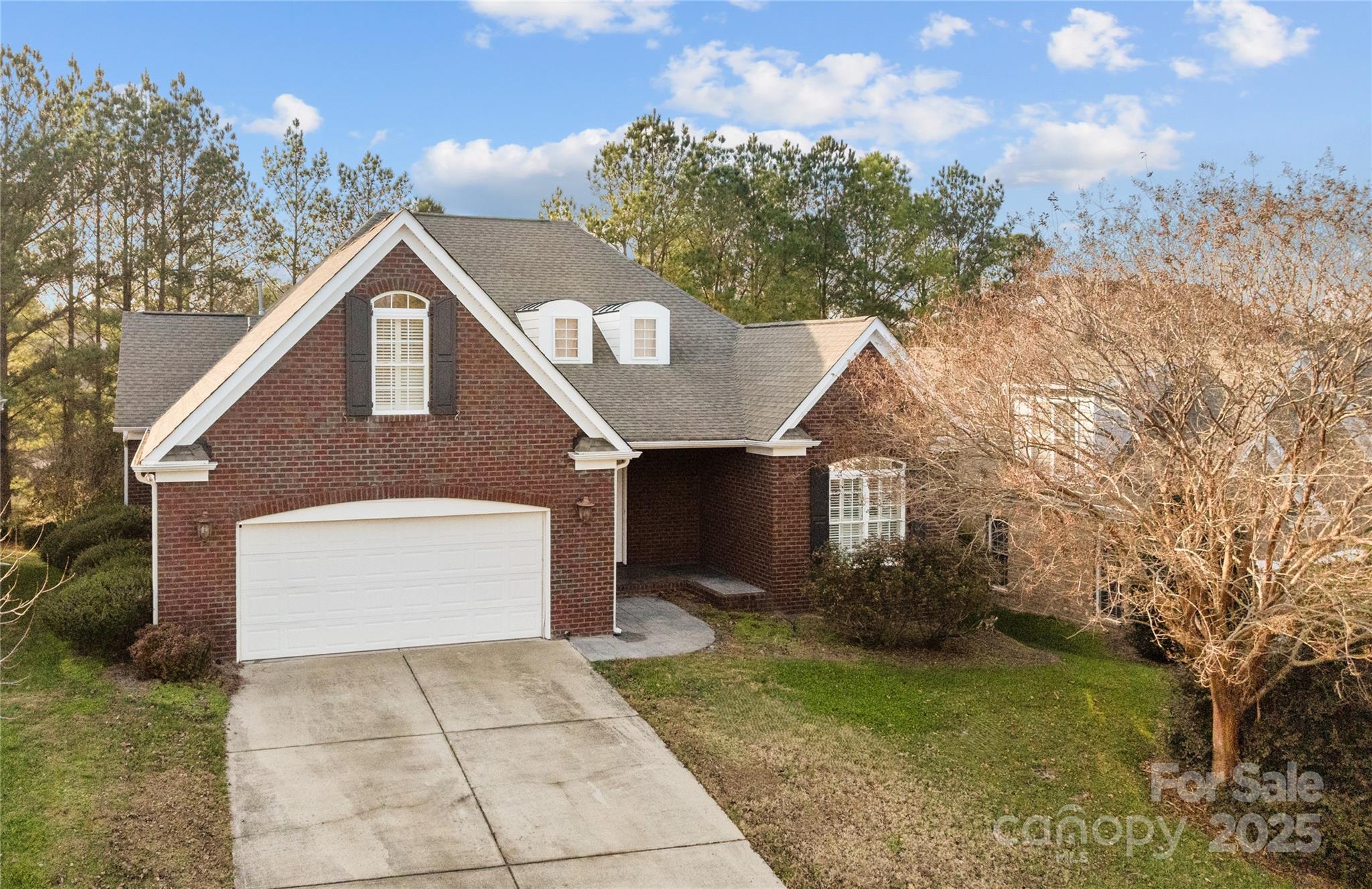 Beautiful all-brick, 3-level home located on the 13th tee of the Waterford Golf Course in the sought after Waterford Glen community. This spacious 4-bedroom, 4.5-bath residence offers over 5,100 square feet of thoughtfully designed living space, including a fully finished basement ideal for multigenerational living, entertaining, or extended guest accommodations.
The main level features an open-concept layout with rich wood floors, abundant natural light, and a formal dining room highlighted by a dramatic double-tray ceiling and custom wainscoting plus a guest bedroom w/Full Bath & separate study area. Kitchen has double ovens, granite tops & matching backsplash + huge walk-in pantry. The primary bedroom suite is conveniently located on the main floor and includes an oversized ensuite bath + his & hers custom closets. Additional conveniences include a tankless water heater, built-in vacuum system, and a large main-level laundry room w/sink. The fully finished lower level expands your living options with a second kitchen, two bedrooms, 1.5 baths, multiple living and flex areas, and a utility room—perfect for recreation or separate living quarters. Outdoor living is easy with golf-course views from the semi-private backyard, offering a peaceful backdrop for relaxation or gatherings. And – the Hot Tub Conveys! Located close to shopping, dining, and major commuter routes, this home offers exceptional space, comfort, and a premium golf-course setting. Overall – The Perfect Home In The Perfect Location. Do Not Wait On This One! Bring Your Offer Today. Motivated Sellers & Priced Right For A Quick Sale! BACK ON MARKET - NO FAULT OF SELLERS!