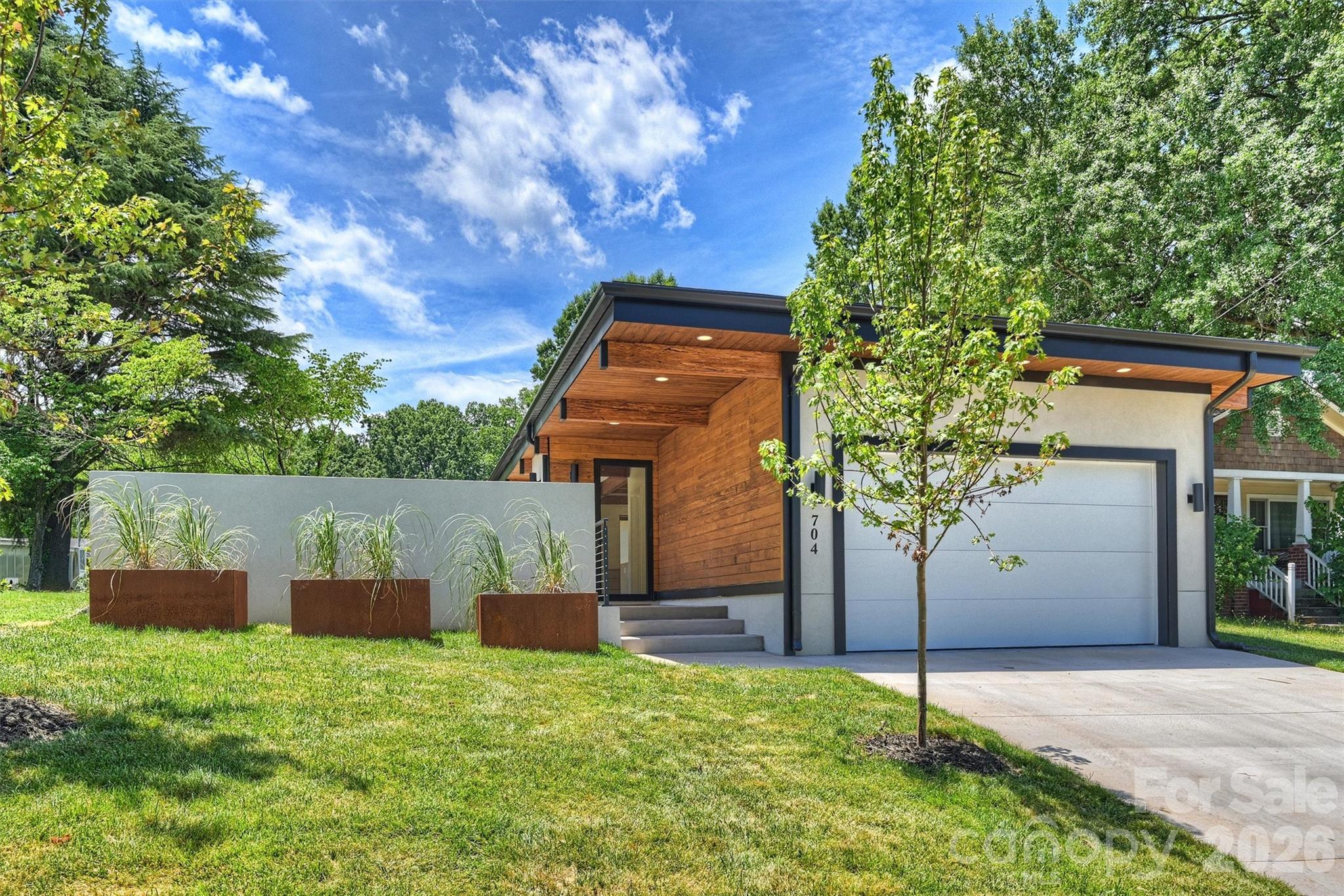 New construction home designed by architecture firm Assembly AB. This contemporary home with subtle mid-century modern influences offers 4 bedrooms, 3.5 bathrooms, and a 2-car garage. The open floor plan is designed for both everyday living and entertaining, featuring a spacious living and dining area separated by a large gas fireplace. The kitchen is equipped with Thor appliances, features two large islands and abundant cabinet space, and overlooks the main living spaces.

Large windows throughout the home provide abundant natural light. The primary suite includes private courtyard access, an en suite bathroom with a garden tub, and a large walk-in closet. Outdoor living spaces feature a large partially covered paver patio, fenced backyard, and in-ground irrigation system. Thoughtful design elements and functional outdoor areas create the perfect setting to relax, entertain, and enjoy everything this exceptional home has to offer. Home was designed by architecture firm Assembly AB