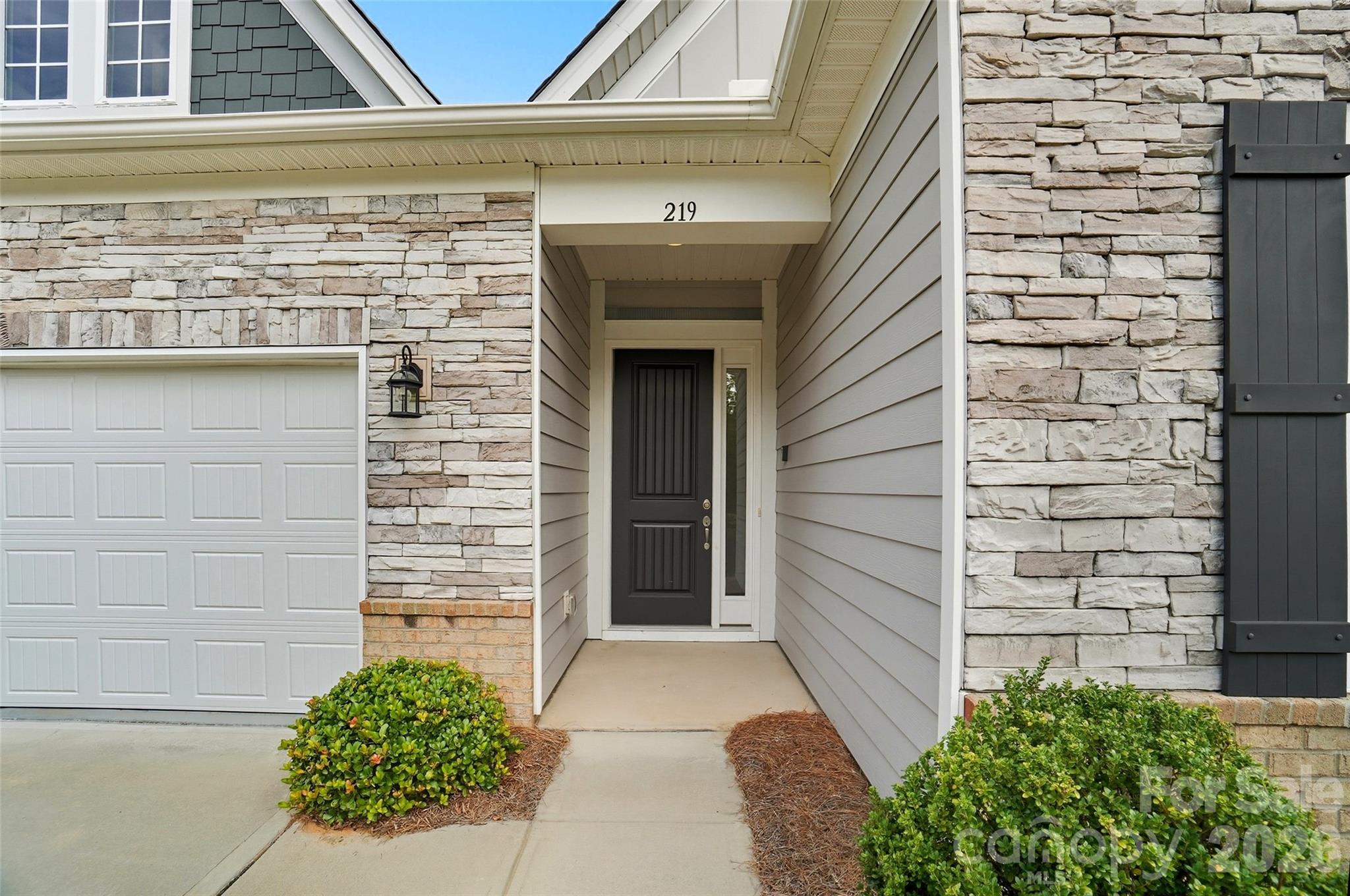 Welcome to this beautifully designed and rare 3-bedroom, 2.5-bath, one-story home located in the sought-after 55+ community, Pinnacle of Wesley Chapel. With thoughtful upgrades and a smart layout, this home offers both elegance and convenience. Step inside and be greeted by soaring ceilings and tall doors that create a bright, open feel throughout. The plantation shutters on every window add timeless charm while allowing you to control natural light with ease. The open-concept floor plan seamlessly connects the living, dining, and kitchen areas—perfect for both entertaining and everyday living. A cozy all-seasons room provides the ideal spot to enjoy morning coffee or unwind with a good book year-round.The primary suite is a true retreat with a laundry room conveniently located off the spacious master closet, that you can also access in the hallway for maximum flexibility. Two additional bedrooms and another full and half bath give plenty of room for guests or hobbies.This home combines comfort, style, and thoughtful design—everything you need to enjoy a relaxed lifestyle.