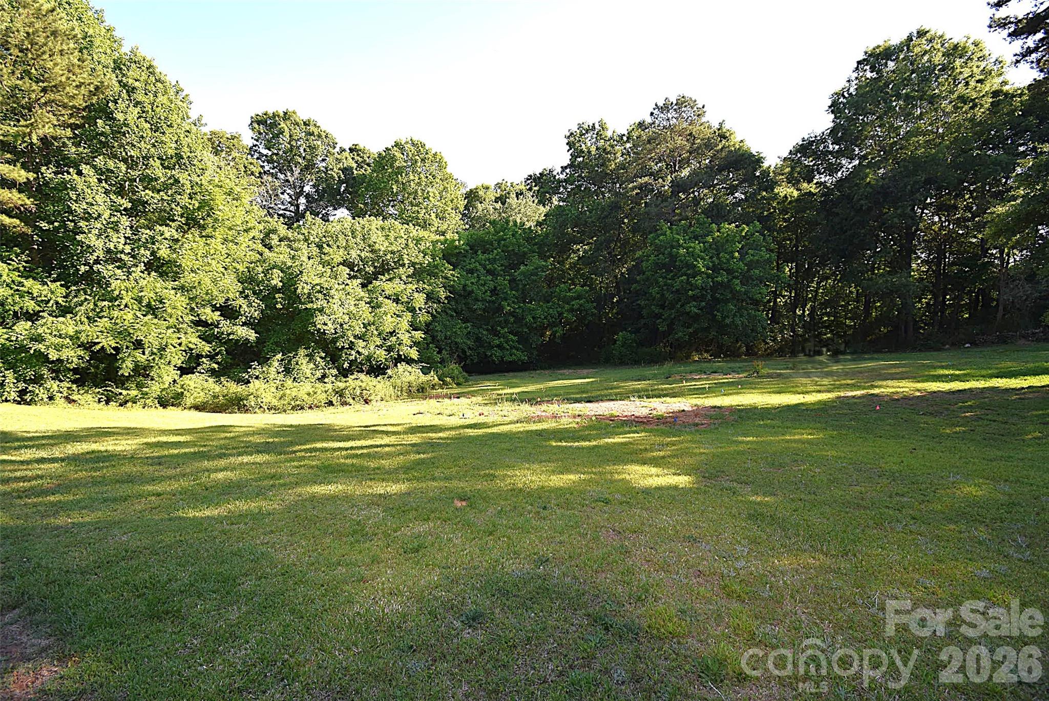 Nice building lot located in the New Hope Elementary, Cramerton Middle, and South Point High School District. Farmwood is an established neighborhood in the Sounth New Hope Rd area. No City Taxes and no HOA.  The Seller has had the County out to do an Initial Perk. Info in the media section. Lot survey in the media section.