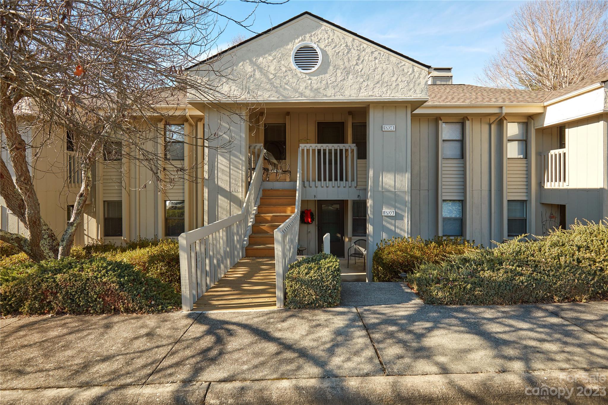 Live in the Cloisters Community, one of Asheville's favorite condo communities!  This spacious unit is in a private and quiet location, tucked above the Asheville Golf Course, in the Beverly Hills area of East Asheville.  Minutes from all the great restaurants and shopping of Biltmore Village, Oakley, and Tunnel Rd.  Situated only a short 10-15 mins drive from both downtown Asheville and Black Mountain, with quick and easy access to both I-40 and I-240.   This beautiful unit has had new floors recently installed, as well as newer appliances.  Master Bedroom has an ensuite bathroom with walk-in shower.  Enjoy the back screened in porch overlooking the woods with your favorite beverage.  Cozy up at night beside your gas fireplace in the living room.  Wonderful community center onsite, with a lounge, meeting room, swimming pool, and pickleball courts.  Sidewalks and walking areas throughout the commUnity.  Units rarely become available in the Cloisters, so book your showing today!