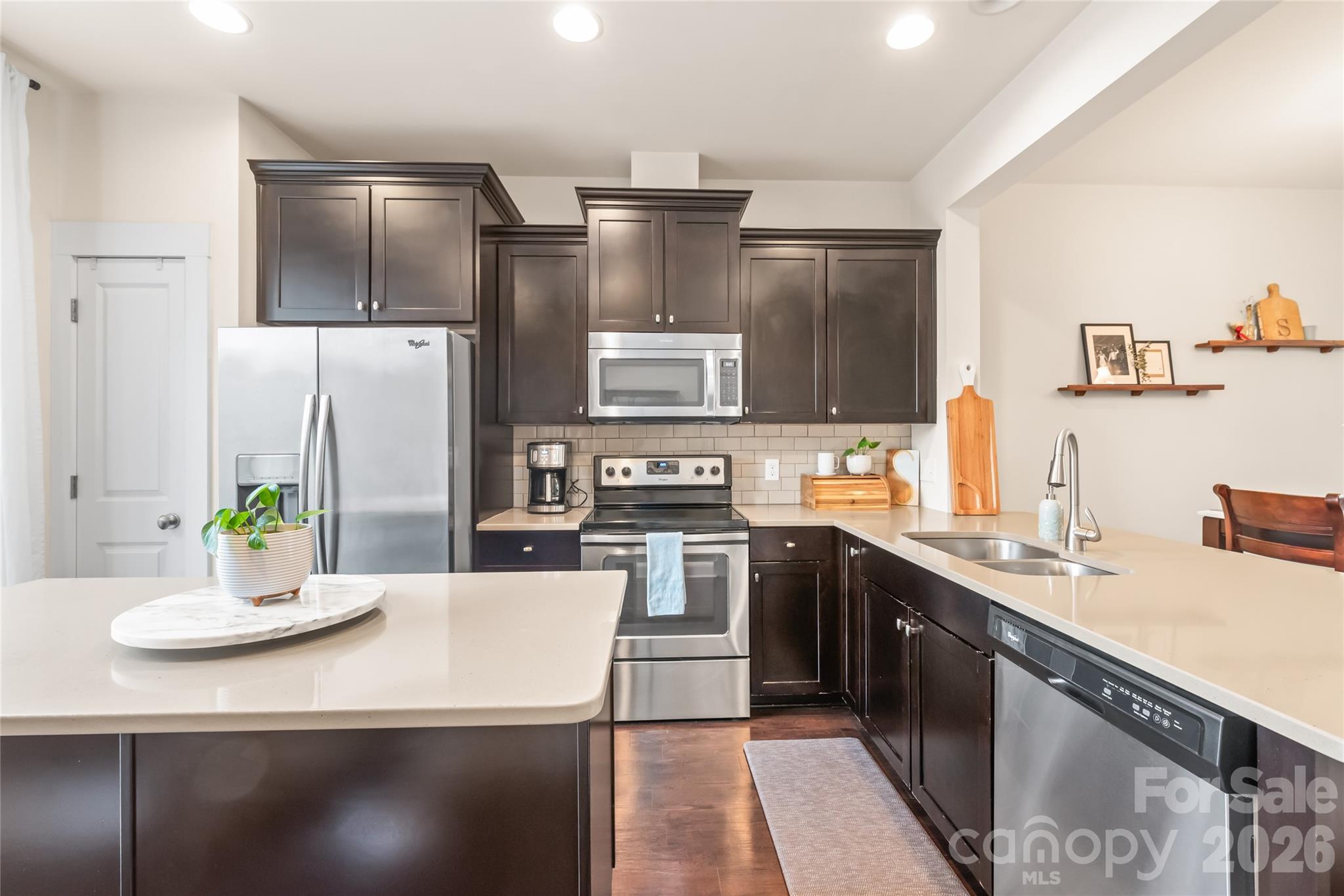Do not miss this Brightwalk townhome! Nestled in the beautiful Brightwalk neighborhood, it offers a central setting just minutes from Uptown. Enjoy the convenience of living in a wonderfully maintained 2-bedroom (plus loft!), 2.5-bath townhome where you can walk  to Camp North End, and you are only a quick Uber ride to NoDa, The Music Factory, and Optimist Hall.

Inside, the townhome features a spacious living area that opens to the stunning kitchen, complete with large island, ample cabinet space, and a pantry. Just off the kitchen, an inviting patio provides the perfect spot to enjoy your morning coffee or unwind at the end of the day. 

The upper level includes a spacious primary bedroom with an ensuite bath and  generous walk-in closet. You’ll also find a versatile loft on this floor—ideal for a home office or additional living space. The top level offers a bright and private guest suite with a light-filled bedroom and a full bath.
