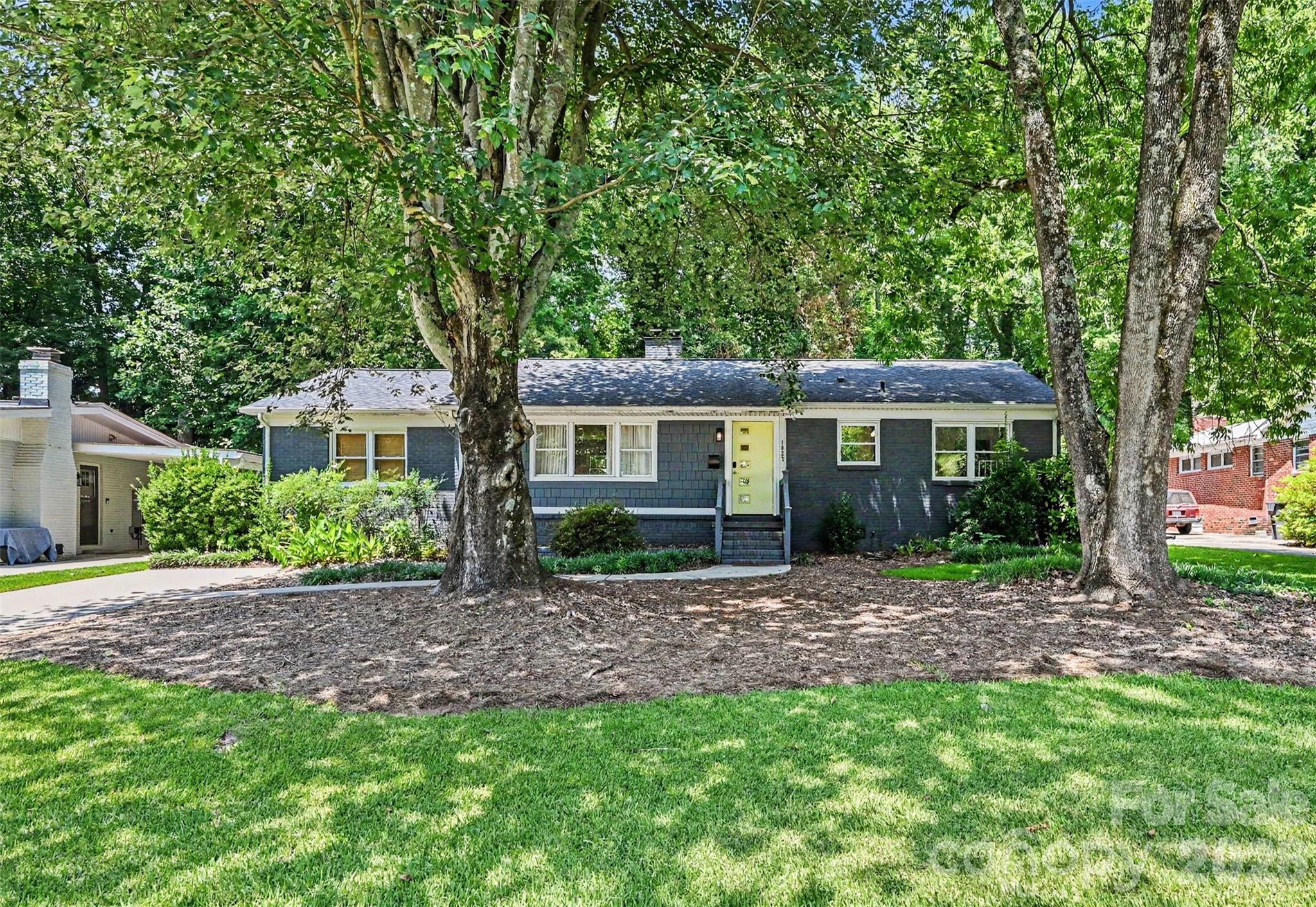 Welcome to this beautiful ranch home nestled in the heart of Eastway Park, where timeless charm meets modern style. Set beneath a canopy of mature trees on a spacious, fenced homesite, this move-in ready residence offers an inviting open-concept layout filled with natural light and thoughtfully designed living spaces perfect for both everyday living and entertaining. The gorgeous kitchen flows seamlessly into the dining and living areas, while the split-bedroom floor plan provides added privacy. Stylish finishes throughout, including contemporary design touches, create a home that feels both sophisticated and comfortable. Step outside to enjoy the expansive, level backyard with a large patio, offering plenty of room for outdoor dining, play, gardening, or future entertaining.
Located just minutes from Plaza Midwood, NoDa, Uptown Charlotte, Oakhurst, and Cotswold, Eastway Park is one of Charlotte's most desirable established neighborhoods, known for its tree-lined streets, community feel, and convenient access to local parks, greenways, shopping, breweries, restaurants, and entertainment. With easy access to major highways and everything the city has to offer, this home combines modern living with an unbeatable location.
