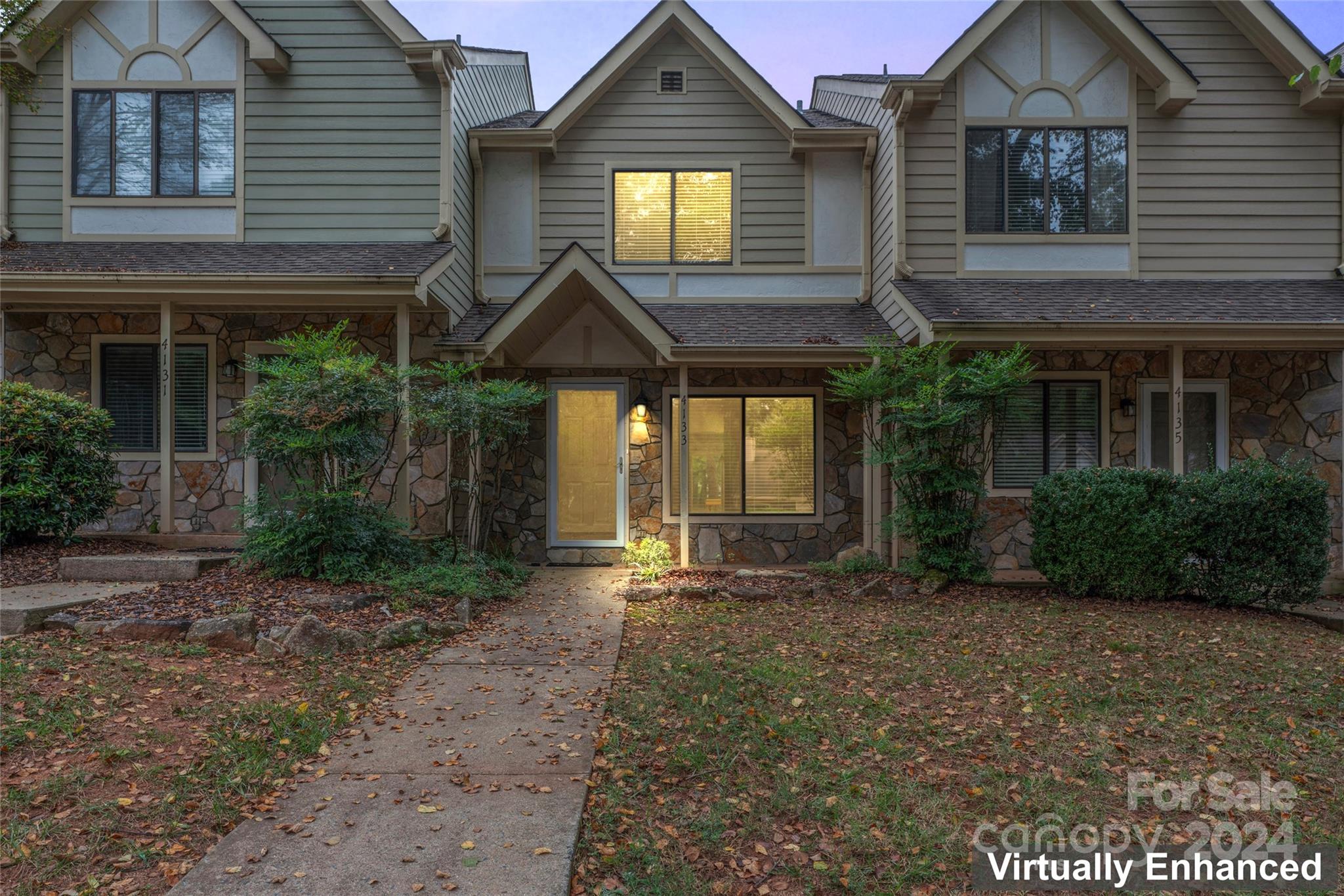 Discover this inviting 2-bedroom, 1.5-bath townhome featuring a highly functional layout. So many updates throughout including new paint throughout and new flooring throughout! The spacious living room is flooded with natural light, perfect for relaxation or entertaining. The stunning white kitchen includes a cozy eat-in area, ideal for casual meals. Retreat to the two generously sized bedrooms, including a primary suite with an ensuite bath and vaulted ceiling, adding an airy feel. Step outside to your back deck, where you can enjoy ample storage space and breathtaking views of the golf course. Don’t miss this opportunity to make this home yours! Conveniently located- the Raintree Country Club and Golf Course is right in your backyard, Minutes from the Four Mile Creek Greenway, Big Rock Nature Preserve, and the shops and restaurants at Stonecrest, shops and restaurants at Ballantyne's Backyard. This location is hard to beat!