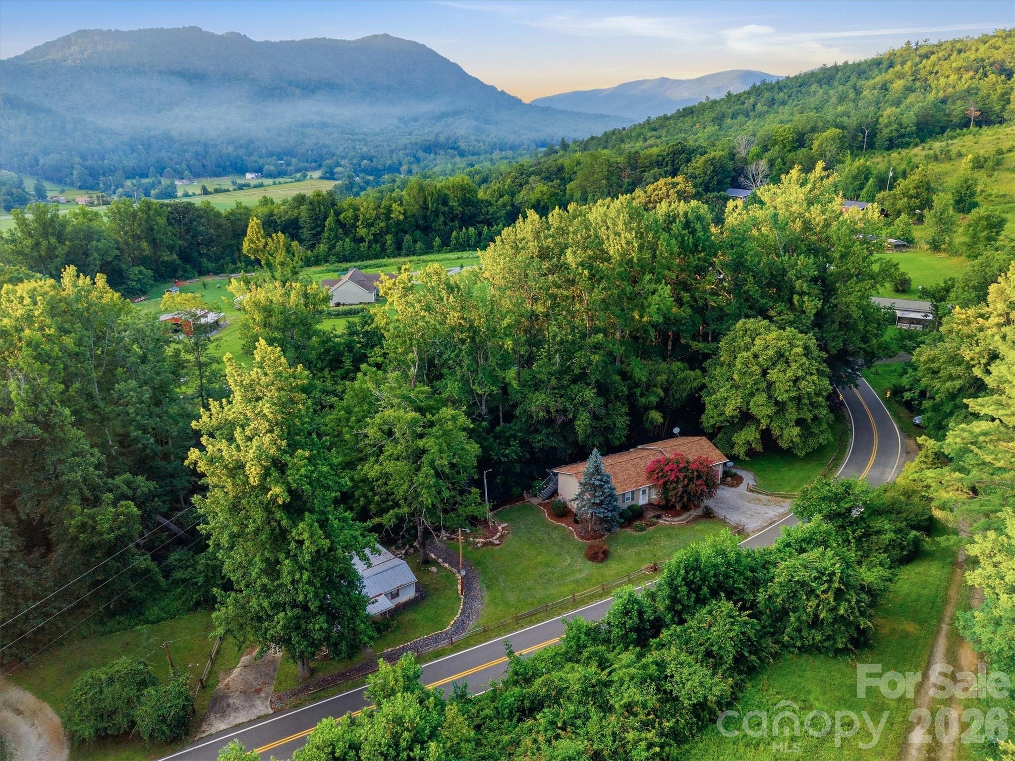 This charming country home located in a peaceful valley offers abundant privacy, seclusion and convenience.  Enjoy the one level living with 3 bedrooms and 1 bath. New Roof (June 2026) Outdoor living and entertaining are effortless here--quiet morning coffee on the deck overlooking the creek.  Also included ADU that has been finished on the property great for additional family and guests. Home is ready to move in to and being sold fully furnished.