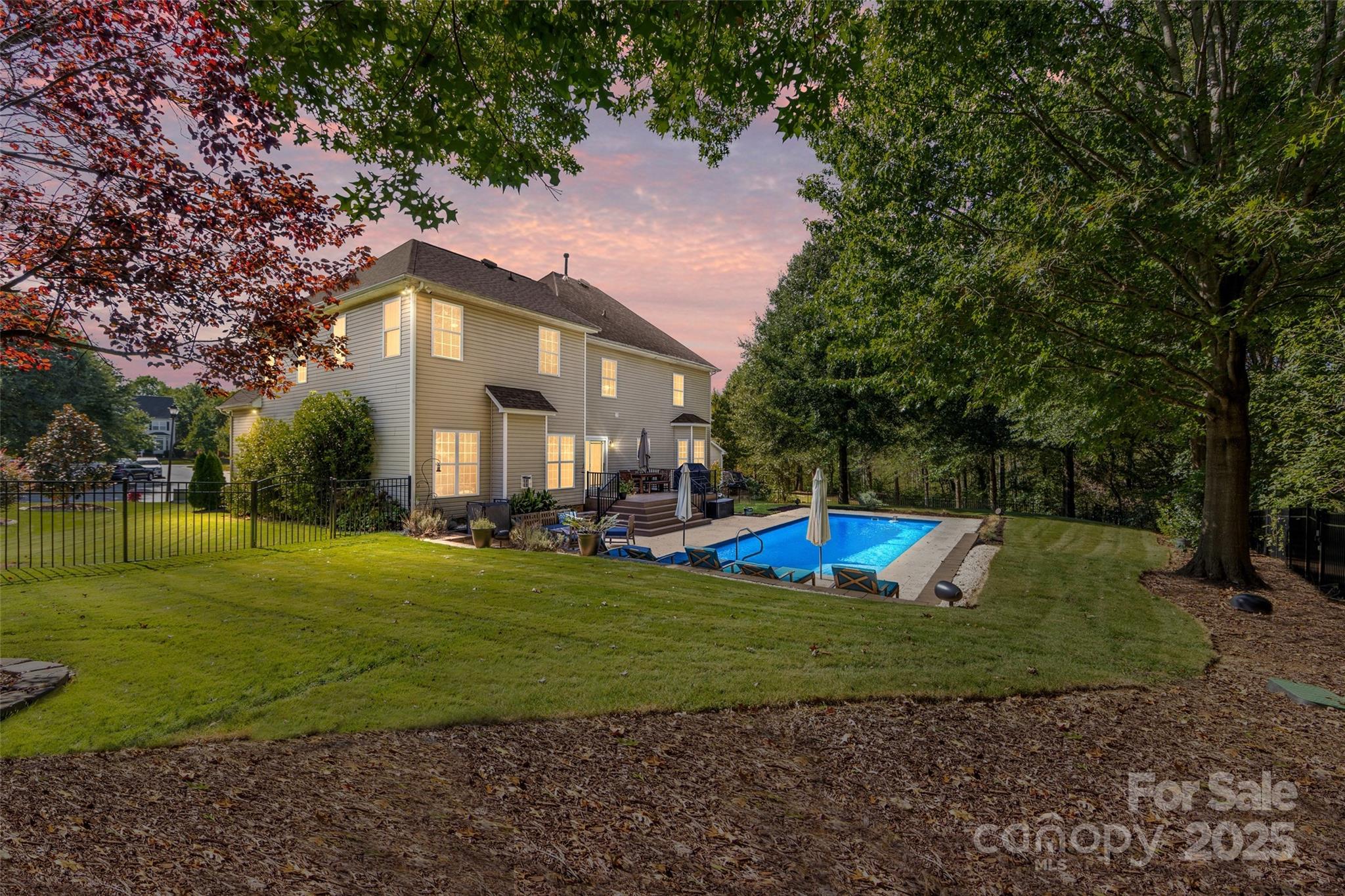 Look NO further! Extraordinarily UPDATED 4BR home on a cul-de-sac with a swimming pool! This home has upgrades throughout including LVP flooring & a renovated Kitchen with white cabinets to the ceiling, quartz c-tops,  center island w/bar seating, subway tile back splash, SS appliances & under cabinet lighting.  Private office on the main level w/glass French doors! Two-story Foyer w/new chandelier. Formal DR & LR feature moldings + tray ceiling. Spacious Great Rm w/gas fireplace & recessed lights. Dual staircases w/black spindles! Large Primary Suite has dual French doors, a tray ceiling, recessed lights and a sitting area + Bath w/dual vanities, garden tub, separate shower & walk-in closet. All BR's have ceiling fans. BIG Bonus Rm w/built-in cabinets. Neutral paint throughout home! Backyard paradise features a salt-water pool with travertine tile surround and a Timbertech deck. There's more...a tankless water heater, whole-house water purifier and built-in speakers. Two car garage with built-in storage above the doors. Super easy access to I-77 and a quick commute to Charlotte. This one has it ALL and could not be more MOVE-IN Ready!
