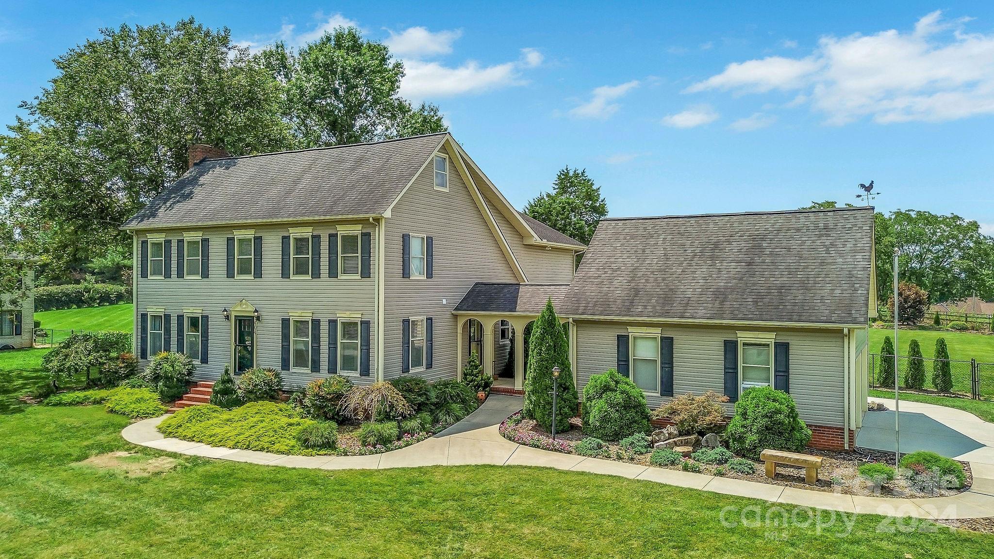 * BACK ON MARKET NO FAULT TO SELLER! *Welcome to your dream home in the exclusive Baymount Meadows! This meticulously crafted custom residence boasts 5 spacious bedrooms and versatile flex rooms perfect for a home office or creative space. The warm, wood-burning fireplace complements the gleaming hardwood floors, creating a cozy yet elegant ambiance. The heart of the home, a gourmet chef’s kitchen, is a culinary masterpiece with custom-built shelves for a touch of luxury. Outside, the private backyard beckons with a custom pergola and a stunning full brick fireplace—ideal for unforgettable evenings and sunset views. The side-load, two-car detached garage features a unique walk-up storage area and an expansive attic, offering endless storage possibilities. Every detail of this home has been designed with sophistication and functionality in mind, making it the perfect sanctuary for those who value both style and comfort. Septic in front can add pool to back