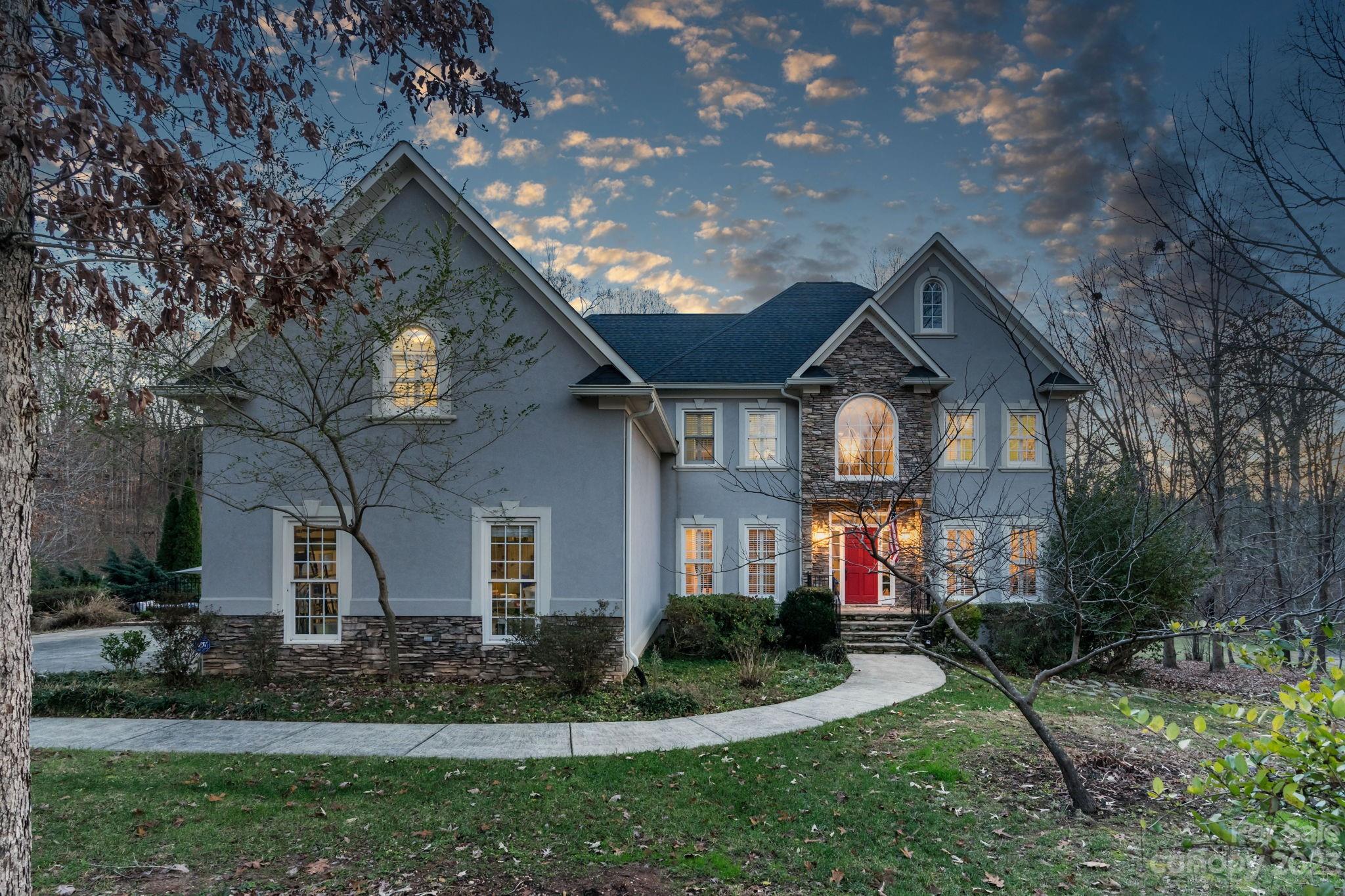 Stunning custom built 4 bed/4.5 bath home w/walk out basement is ready for new owners! This Walden Pond estate home sits on 2.35 acres & is located on a cul-de-sac, surrounded by mature trees. Buyers will love the open floor plan w/a grand foyer, spacious 2 story great room w/double sided fireplace, gourmet kitchen, elegant dining room, dedicated main level office & a huge primary suite w/sitting room, flex space, a large walk in closet & spa like bath. Basement w/2nd kitchen, rec room & full bath lead to outside oasis. Entertaining is a breeze both inside and out with the sunroom, multi level decks, heated pool/spa and paved patio areas. The vaulted ceilings, hardwood floors, dual staircases and gorgeous millwork are just a few of the custom details that make this home so special. Enjoy award winning schools, lower Union County taxes, close to Historic Downtown Waxhaw as well as all of the amazing things the Queen City has to offer! Don't wait, this opportunity won't last long.