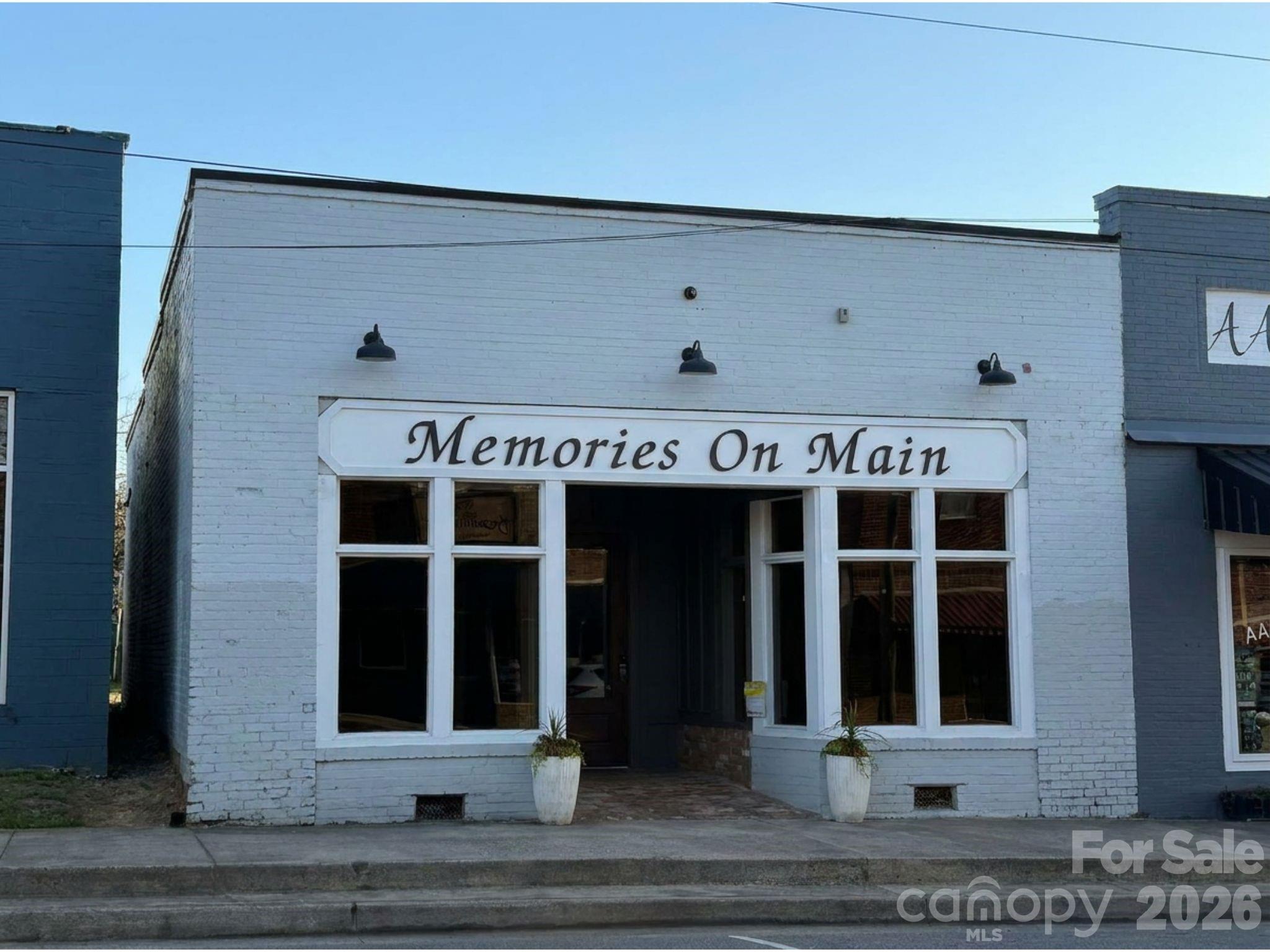 Your opportunity to own a business or earn rental income in downtown Maiden! This is essentially a brand new building inside a classic 1920s brick shell. Completely rebuilt from the inside out with new central HVAC, new plumbing, new electrical with a 400-amp panel ready to power any commercial operation, and a sealed white roof maintained annually to keep energy costs low. Features include a built-in bar, 12-ft ceilings, large display windows, and a patio for outdoor dining. Ready for a restaurant, bar, coffee shop, cafe, or any concept you bring. Proven rental history with the owner ready to pass the torch. Maiden is a growing community. Open your own doors or lease it out.