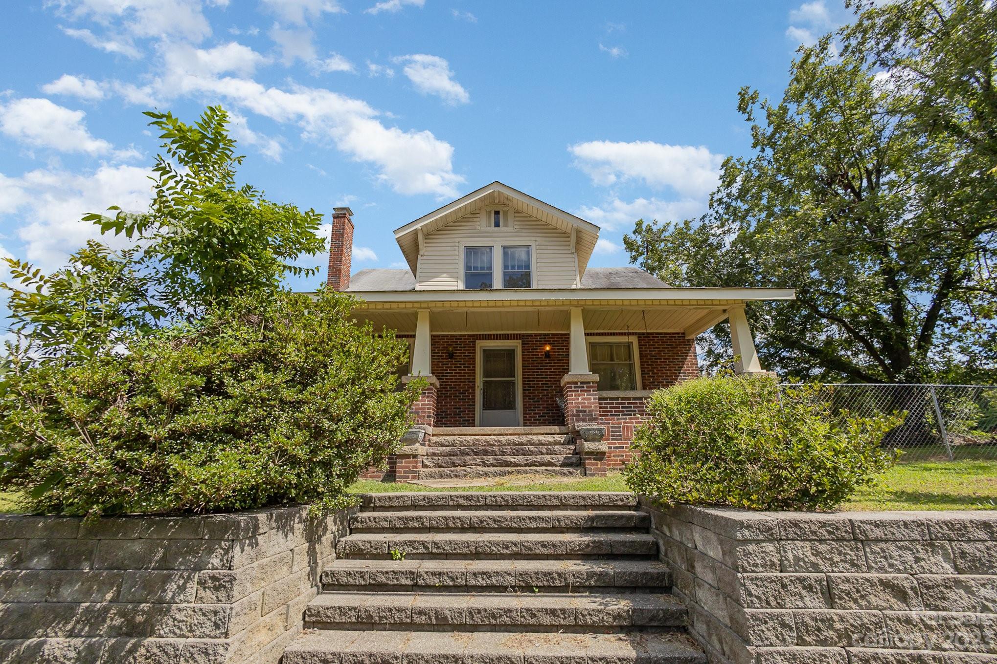 Classic 1.5 story all brick home in China Grove waiting for you to put your touch on it. The home sits on 1.5 acres and has easy access to 1-85 with NO HOA. Downstairs has large living room and two bedrooms. Upstairs has three rooms and a bathroom. Large covered front porch is perfect for sitting and enjoying those beautiful fall evenings.