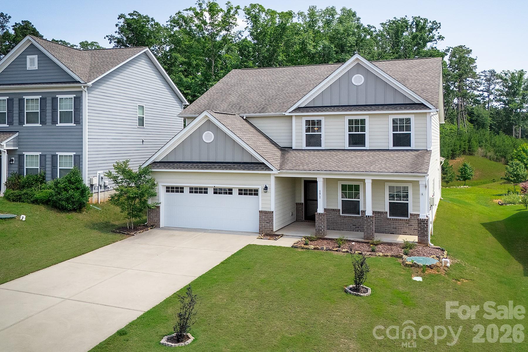 Take advantage of a $1,500 buyer concession and an assumable mortgage at an attractive 5.99% interest rate! Nestled on one of the largest lots in Tillery Tradition and backing directly to the golf course, this beautiful 2019-built Wakefield model by TruHomes offers an exceptional blend of space, comfort, and style.
The thoughtfully designed floor plan features 5 bedrooms, 3.5 baths, a dedicated office, dining room, mudroom, and a spacious bonus/game room. The heart of the home is the stunning kitchen, complete with granite countertops, a large island, stainless steel appliances, and a convenient butler’s pantry. The open-concept living room is anchored by a cozy fireplace, creating an inviting space for gathering and entertaining.
The main-level primary suite provides a private retreat with a luxurious bath featuring a soaking tub, dual vanities, and a tile shower with dual shower heads. Upstairs, you'll find four additional bedrooms, a generous bonus room, and a shared bath with dual vanities and separate access for added convenience.
With golf course views, abundant living space, and valuable buyer incentives, this exceptional home offers a wonderful opportunity to enjoy the Tillery Tradition lifestyle.