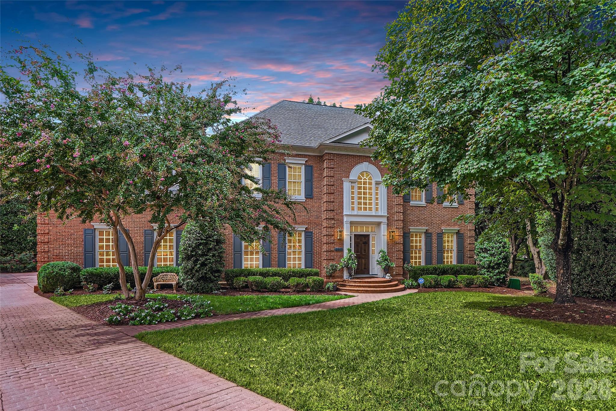 Welcome to 2560 Morrocroft Lane, an exceptional full-brick Colonial in the prestigious Villages of Morrocroft, one of Charlotte's most sought-after neighborhoods in the heart of SouthPark. This beautifully maintained 4-bedroom, 3.5-bath home combines timeless architecture, luxury updates, and an unbeatable location just minutes from SouthPark Mall, Phillips Place, Uptown Charlotte, premier dining, luxury shopping, and top private schools.

From the moment you arrive, the stately brick exterior, manicured landscaping, and impressive curb appeal create an unforgettable first impression. Inside, rich hardwood floors, elegant moldings, abundant natural light, and two fireplaces provide warmth and sophistication throughout the thoughtfully designed floor plan.

The highly desirable main-level primary suite offers comfort and privacy with custom dual walk-in closets, built-in cabinetry, and a beautifully renovated spa-inspired bath featuring an oversized walk-in shower and upscale finishes. A private home office with its own fireplace creates the perfect work-from-home space or executive study.

Designed for both everyday living and entertaining, the spacious living and dining areas flow seamlessly into the heart of the home. Upstairs, generously sized secondary bedrooms and an oversized bonus/billiards room offer exceptional flexibility for a media room, game room, fitness space, or additional family living area.

Step outside to your own private backyard retreat surrounded by mature landscaping that provides beauty and year-round privacy. Relax on the spacious back porch or take advantage of the property's incredible future potential. The current owner has already completed pool planning and verified the backyard can accommodate a custom pool, making it easy to create your dream outdoor oasis.

Living in SouthPark Charlotte means enjoying one of the city's premier lifestyle destinations, with convenient access to luxury shopping, fine dining, parks, greenways, medical facilities, major employers, and Charlotte Douglas International Airport.

Offering a rare combination of classic Colonial charm, modern updates, a main-floor primary suite, flexible living spaces, and an outstanding SouthPark location, 2560 Morrocroft Lane is an exceptional opportunity to own a luxury home in one of Charlotte's most desirable communities. Schedule your private showing today.