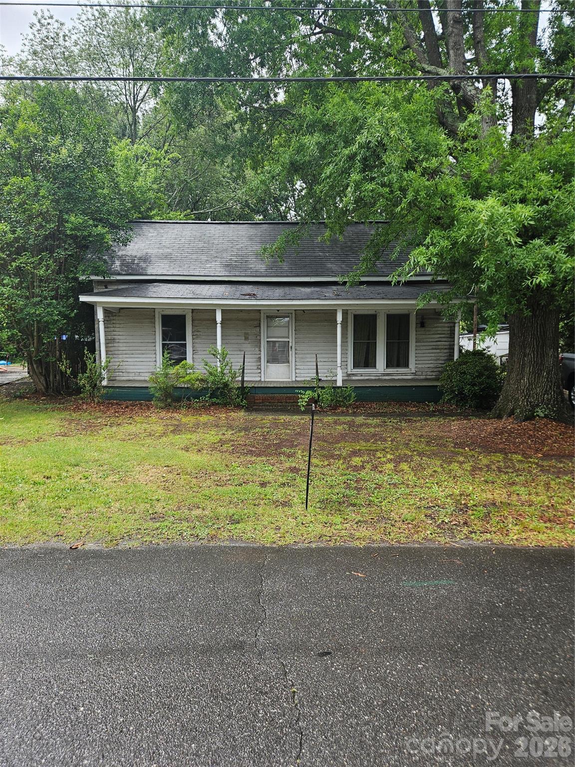Prime location in downtown Belmont! Come see this historical home currently set up with 2 living quarters each with their own kitchen. Rehab the current floor plan or convert to single family living providing ample space for everyone! The yard is flat and has room for all your outdoor activities. Don't miss the opportunity at this great investment! Schedule your showing today.