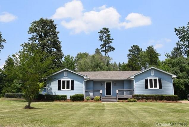 What a doll house!  This home has updated granite kitchen with stainless appliances, work island and tile flooring!  All new carpet, new paint!  Split bedroom plan with updated baths!  Spacious great room with fireplace/gas logs, huge master bedroom.  Outdoor living space includes a large front porch, screen porch and a deck.  Two storage buildings.  Will not last long!