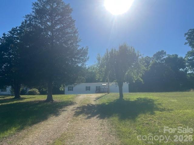 If you are looking for an opportunity to own almost 4 acres in Gods Country, this is it.  Singlewide has been totally remodeled and is eat off the floor clean. Ready for immediate occupancy.   Additional block home in need of extensive repairs.  Home has little value.  Enter at your own risk.  
Cash only sale.