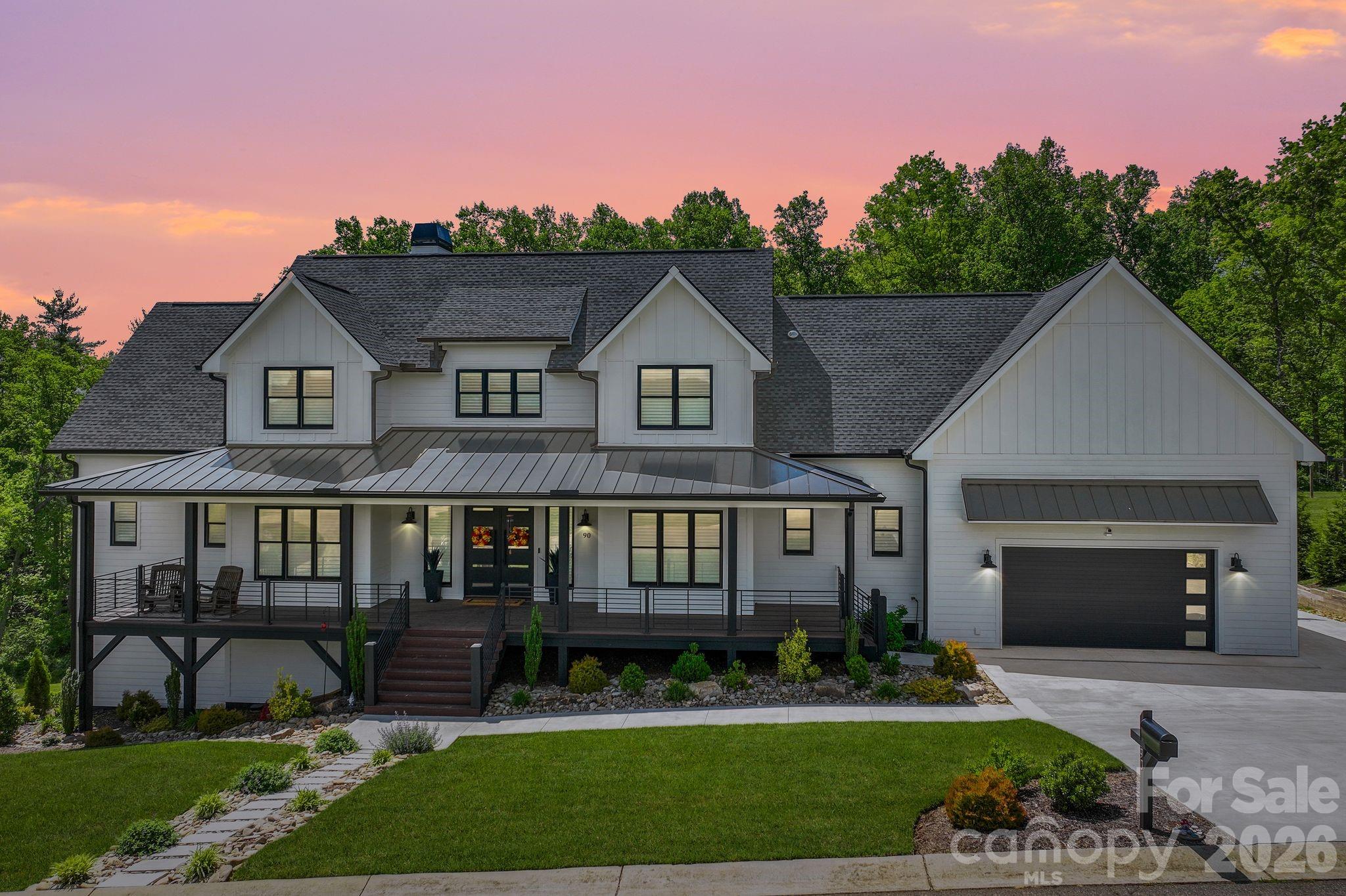 Nestled in a premier location that truly elevates daily living, this luxury residence sits just 10 minutes from the charm and amenities of Weaverville, 20 minutes to the historic downtown of Asheville, and a convenient 30-minute drive to the airport. Location, location, location sums up the essence here, with effortless interstate access that makes commuting or spontaneous getaways a breeze. You’ll enjoy being minutes from premier shopping, dining, entertainment, and a host of cultural experiences, all without sacrificing the serenity of a peaceful, upscale enclave.

Welcome inside to a modern home that marries contemporary refinement with a welcoming farmhouse feel. An expansive open floor plan floods the living spaces with natural light, while generous room counts provide abundant space for family, guests, and creative living—plus storage galore to keep everything neat and organized. Thoughtful conveniences abound, including an EV charger in the garage for modern sustainability. Outside, luxury and leisure await: a large covered front porch beckons for morning coffee or sunset conversations, while a covered back porch invites quiet evenings by the fire, grilling, or entertaining friends and family. An inviting in-ground heated pool rests on a stylish pool deck, perfect for year-round enjoyment. Views of the mountains and fresh, crisp air complete the setting, making every day feel like a serene retreat. The seller sweetens the deal with a 2-10 Home Warranty offered with an acceptable offer, underscoring the commitment to carefree ownership.